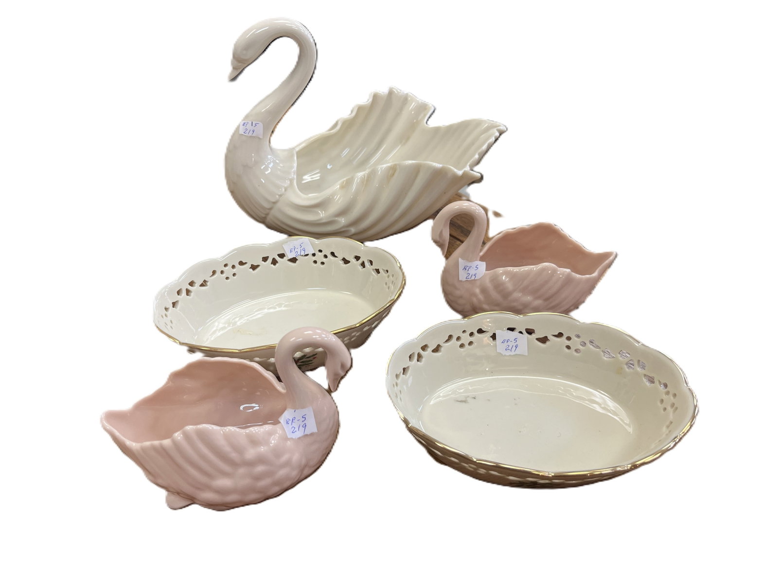 Group of 5 Lenox & Royal Worcester Porcelain Swan and Oval Dishes ? Sold as One Lot: Charming collection of five porcelain decorative pieces, including: (2) Lenox ivory oval dishes with pierced rims and gilt trim, featuring holly motif underside marks. (2) Royal Worcester blush?pink s