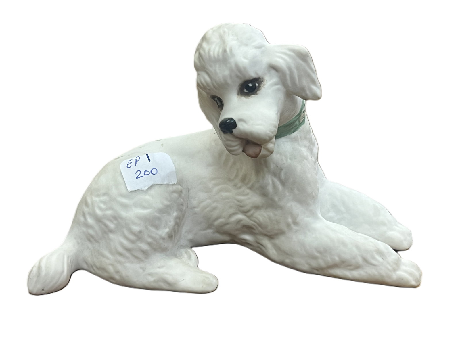 Boehm Porcelain Poodle Figurine: Charming hand?crafted porcelain sculpture of a reclining poodle with finely modeled curly coat and expressive features. The figure is finished in Boehm’s signature matte bisque glaze with a soft gre