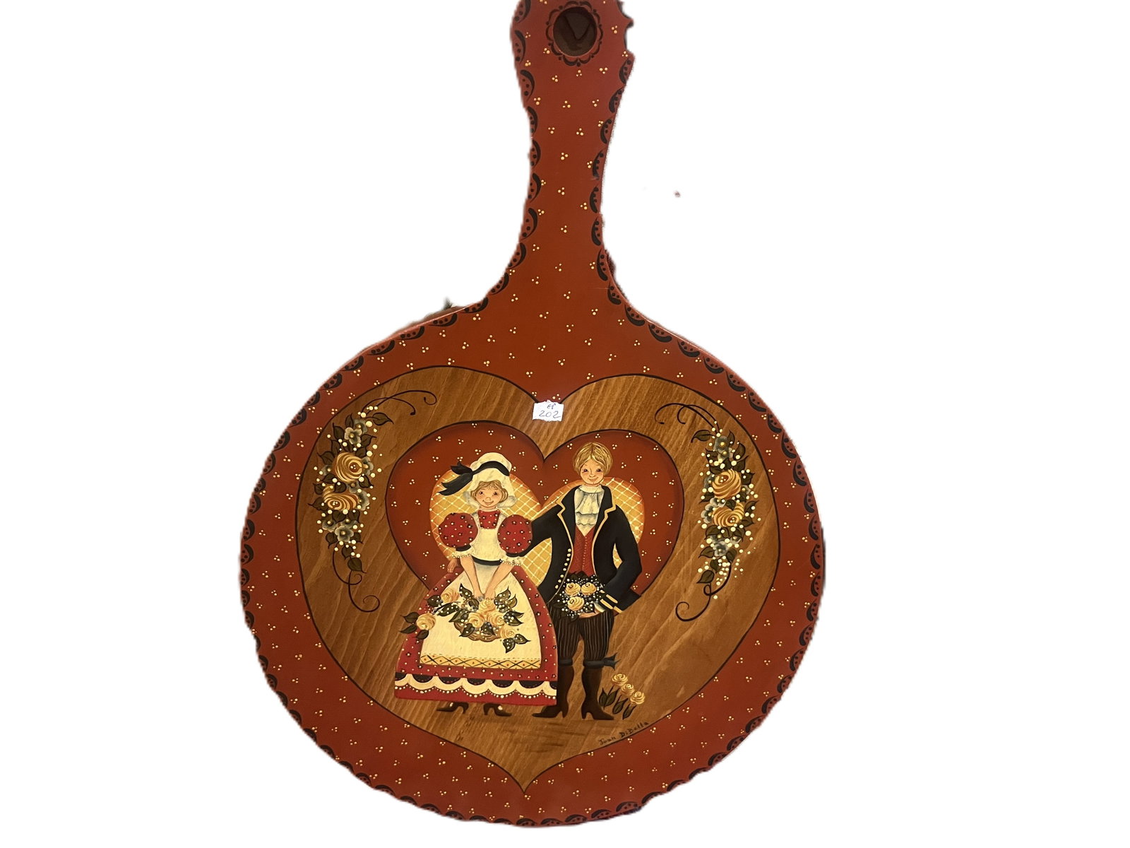 Signed Hand Painted Folk Art Paddle – Couple in Heart Motif, 20.5x14: Charming hand-painted wooden paddle featuring a heart shaped central vignette of a traditional folk couple in period attire, surrounded by floral scrolls and gilt accents. The scalloped border is dott