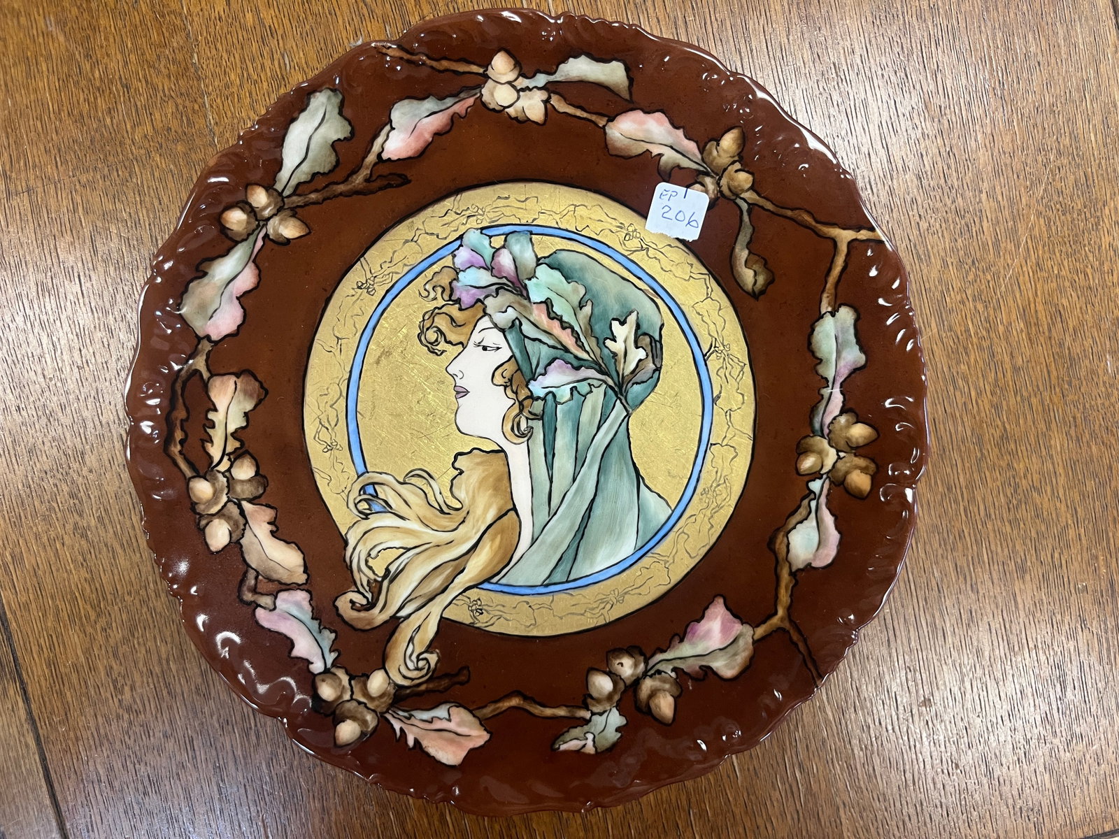 T&V France Art Nouveau Porcelain Plate – Signed: Elegant hand-painted porcelain plate featuring a central medallion portrait of a woman in profile, rendered in flowing Art Nouveau style with soft pastel tones and gilt background. The rim is richly g