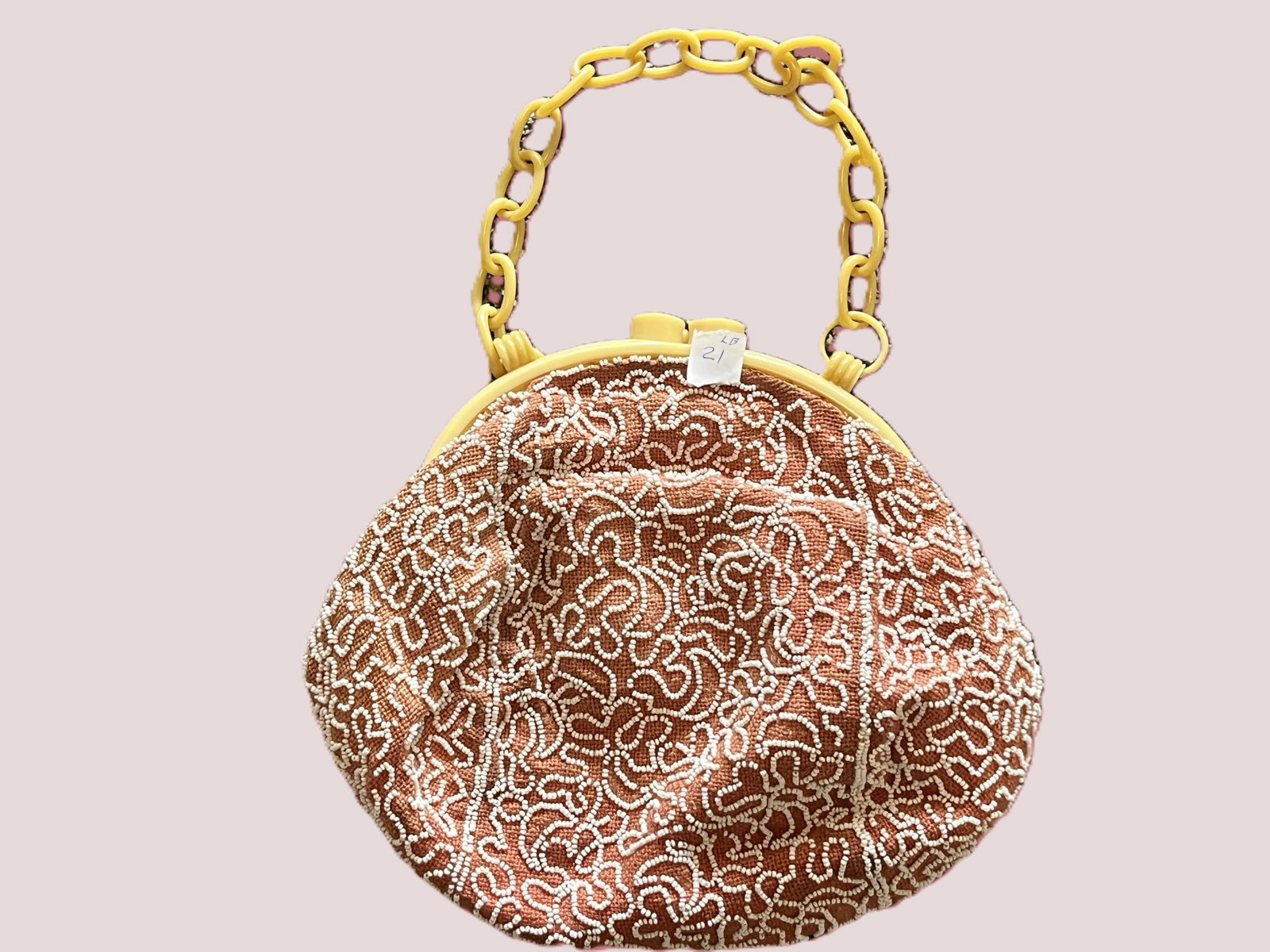VTG Beaded Evening Handbag, Celluloid-Style Frame & Chain Handle: Vintage ladies' beaded evening or cocktail handbag featuring a salmon/coral textile body extensively decorated with white glass seed beads in an elaborate scrolling abstract pattern. Fitted with a dis