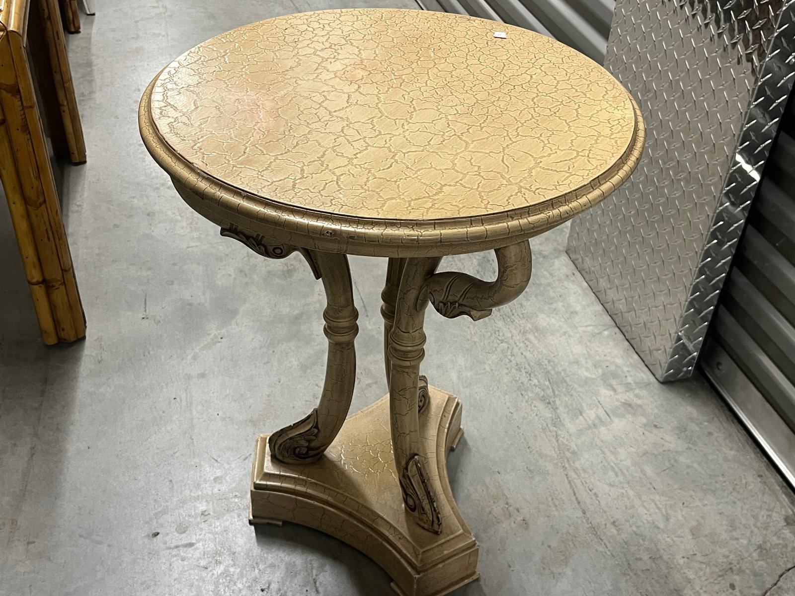 Decorative Swan Pedestal Round Center Table w/ Crackle Finish, 26"H ? 31" Dia.: Decorative round center or foyer table featuring an unusual sculptural pedestal base with three stylized swan-form supports, their gracefully curved necks and carved heads positioned beneath the circu