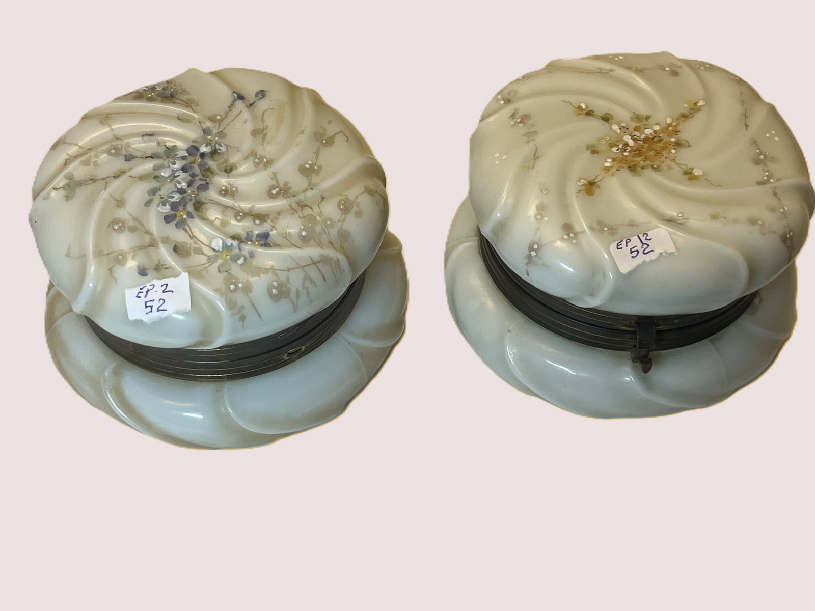 Pair Antique Hand-Painted Porcelain Hinged Dresser Boxes w/ Floral Decoration: Pair of decorative porcelain hinged dresser or trinket boxes featuring unusual molded swirling forms with scalloped bases. Each is decorated with delicate hand-painted floral sprays and raised enamel 
