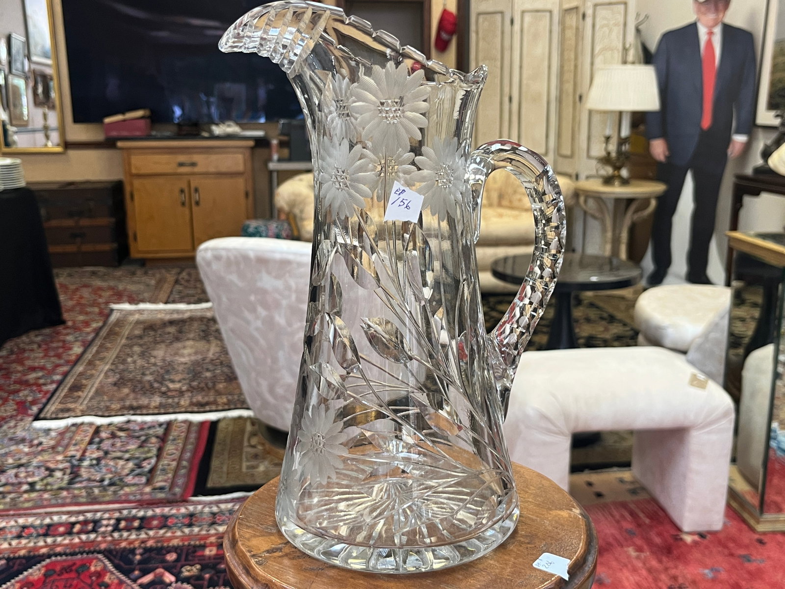 Antique American Brilliant Cut Crystal Floral Water Pitcher, 11.25"H: Impressive antique American Brilliant Period-style cut crystal water pitcher, measuring approximately 11.25" H. Features a tall elegant form with applied curved handle, notched/scalloped rim, deeply c