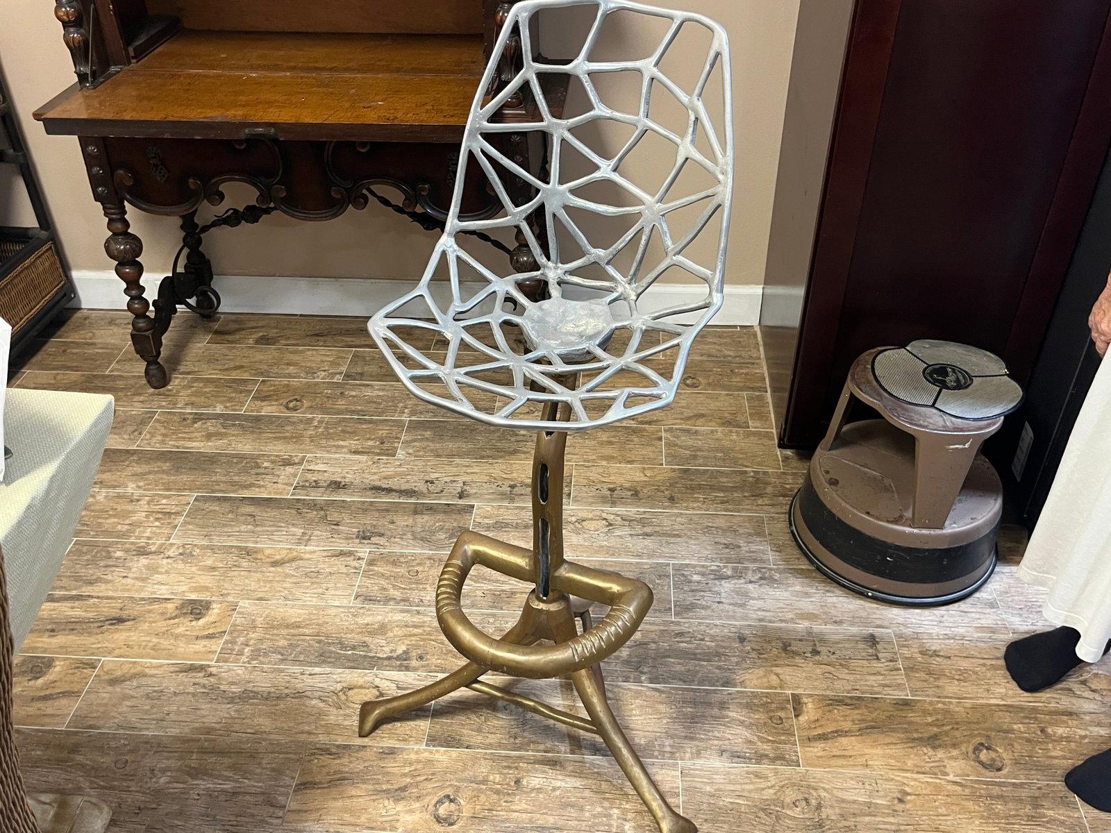 David Marshall Brutalist Cast Aluminum & Brass Bar Stool, Spain, 1970s: Striking vintage sculptural bar stool attributed to David Marshall (Scottish, b. 1942), produced in Spain, circa 1970s. Features a distinctive free-form openwork cast aluminum seat and back resembling