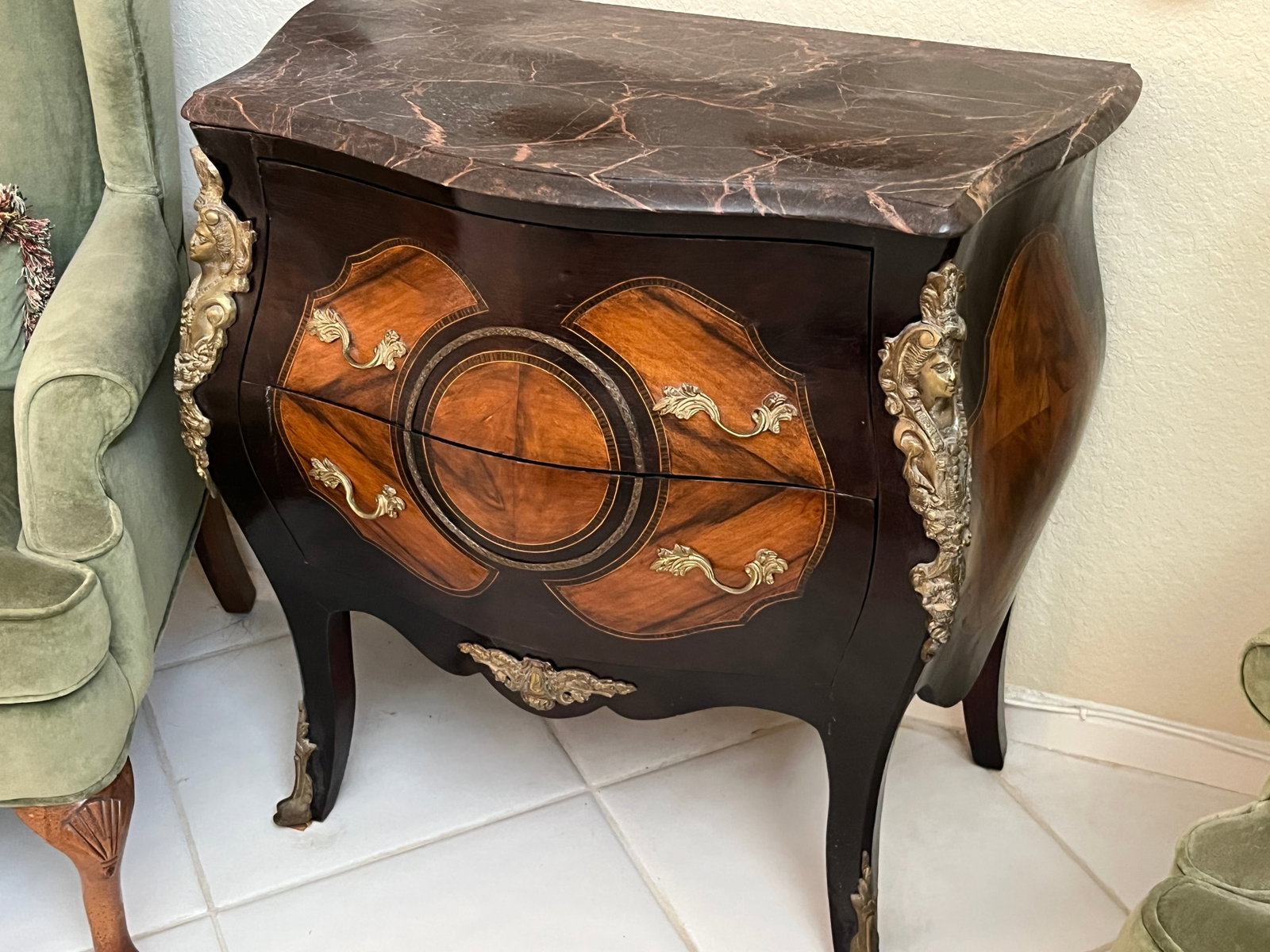 French Louis XV Style Bombe 3-Drawer Commode with Marble Top & Bronze Mounts ? 33"H x 32"W x 19"D: Decorative French Louis XV-style bombe commode/chest, featuring the classic serpentine and bombe-form case with three drawers. The dark-finished case is embellished with contrasting book-matched/inlai
