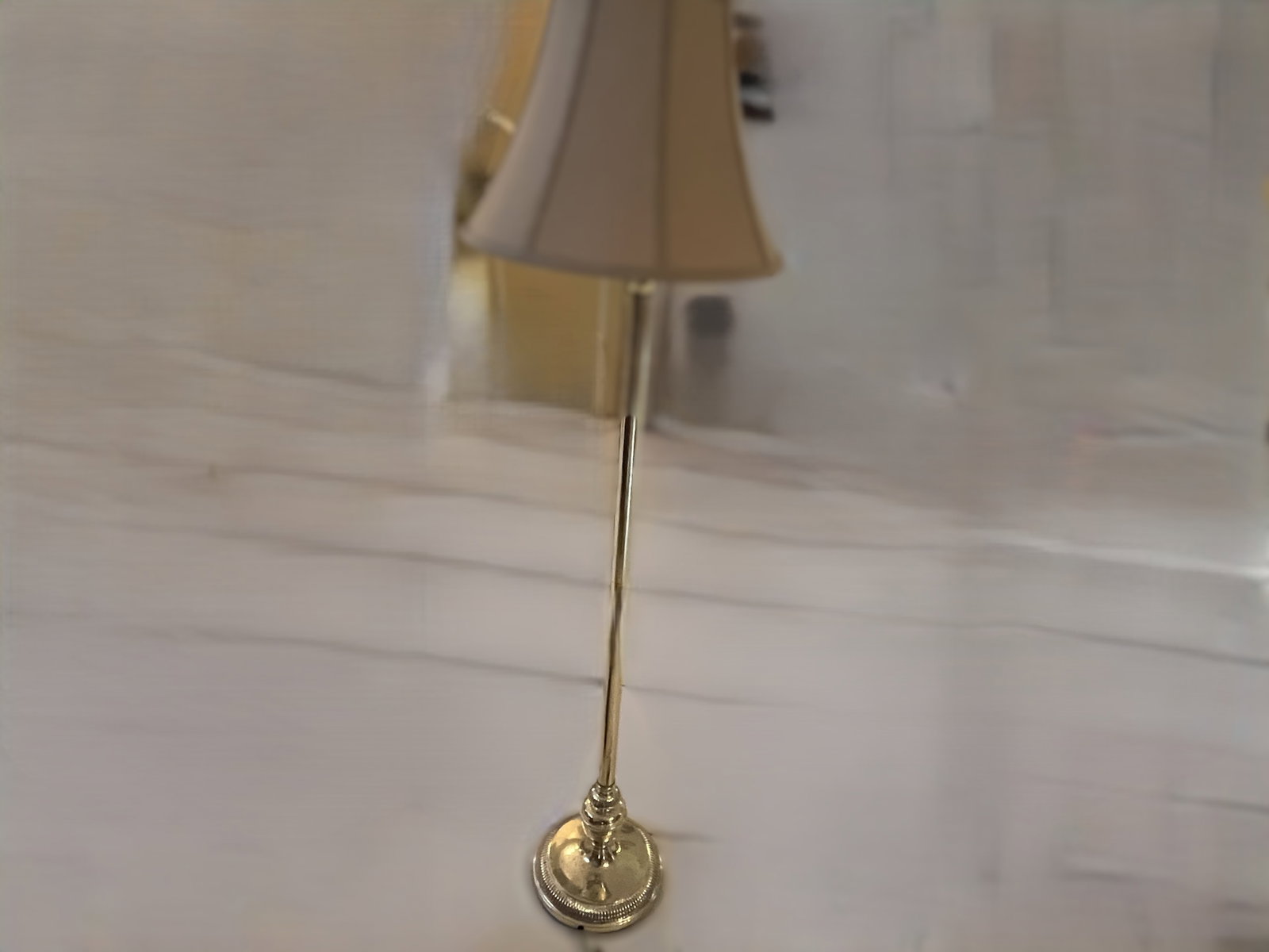5' Tall Traditional Brass Floor Lamp w/ Bell-Form Fabric Shade: Traditional brass floor lamp, measuring approximately 5' tall, featuring a slender brass column supported by a round weighted base with turned detailing and a decorative reeded border.