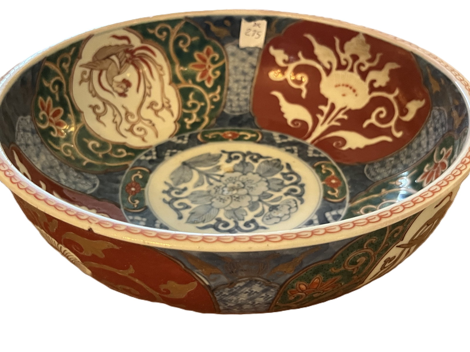 Vintage Japanese Imari-Style Porcelain Phoenix & Floral Bowl, 9.75": Vintage Japanese Imari-style porcelain bowl, measuring approximately 3.5" H x 9.75" diameter. Richly decorated inside and out with traditional iron red, blue, green, cream and gilt decoration. The int