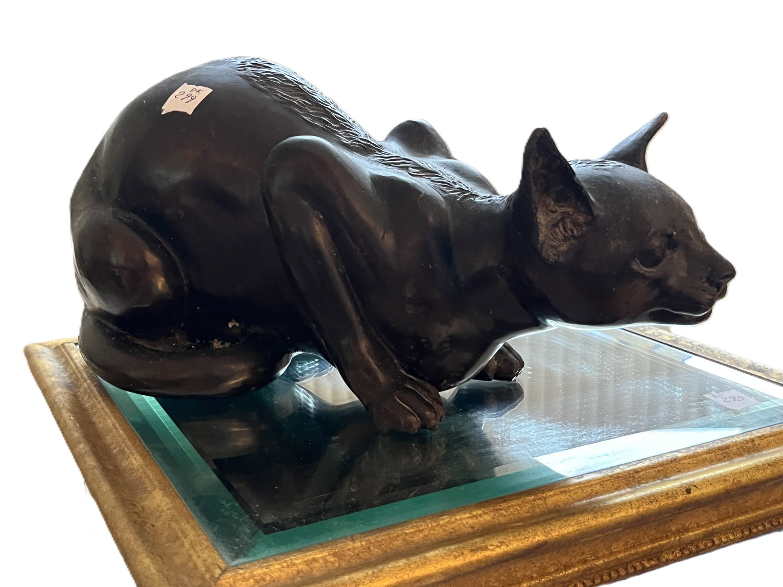 Large Bronze Crouching Cat Sculpture 13" Long: Striking bronze sculpture of a crouching or stalking cat, modeled in a low, alert stance with pointed ears, extended forelegs and raised hindquarters. The smooth dark brown/black patina is accented by