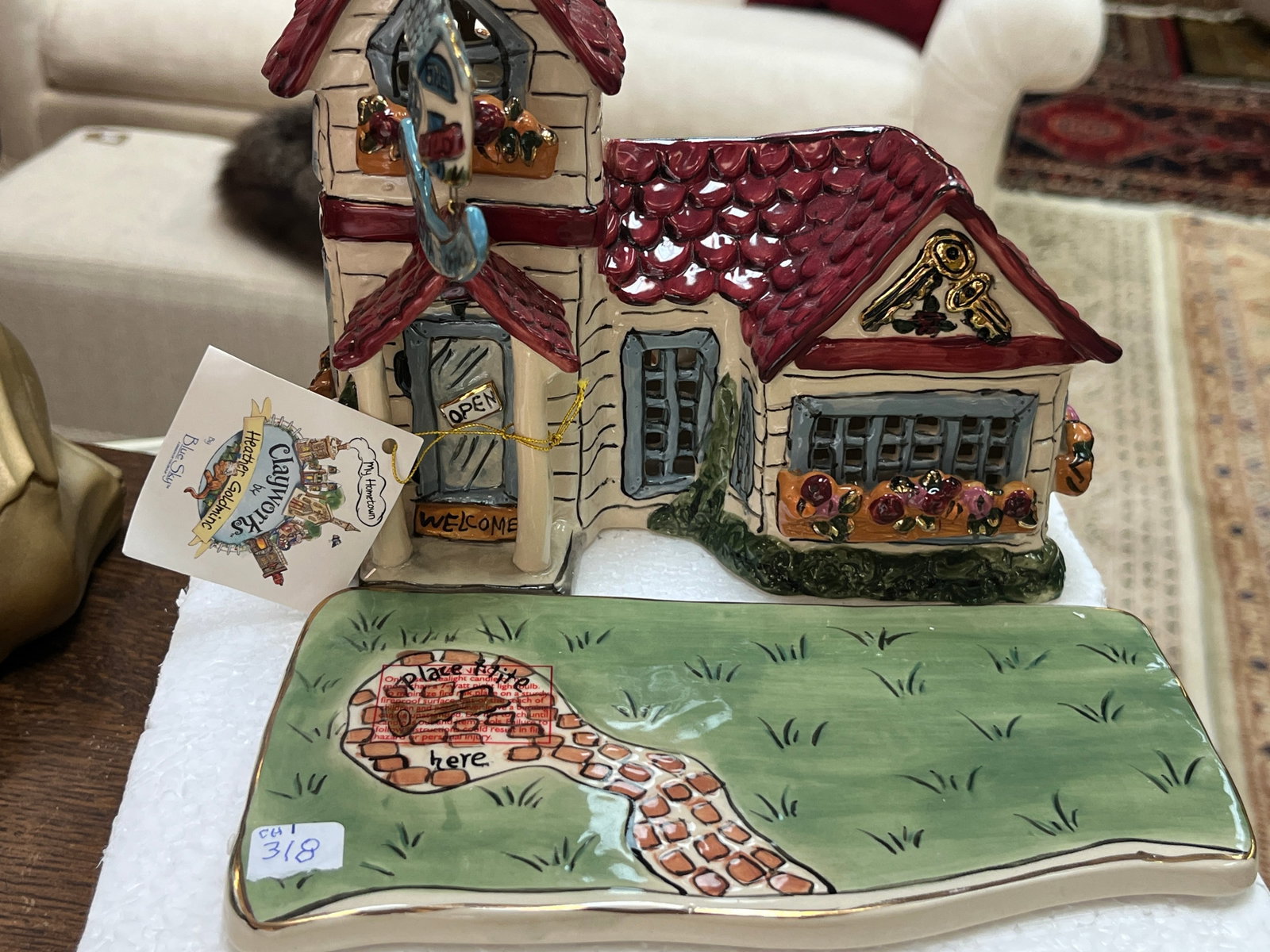 VTG Clayworks by Heather Goldminc ?My Hometown? Ceramic House & Tray: Colorful hand-painted ceramic architectural piece from the Clayworks ?My Hometown? collection by Heather Goldminc for Blue Sky. Whimsical house features deep red dimensional shingle roofs, gray window