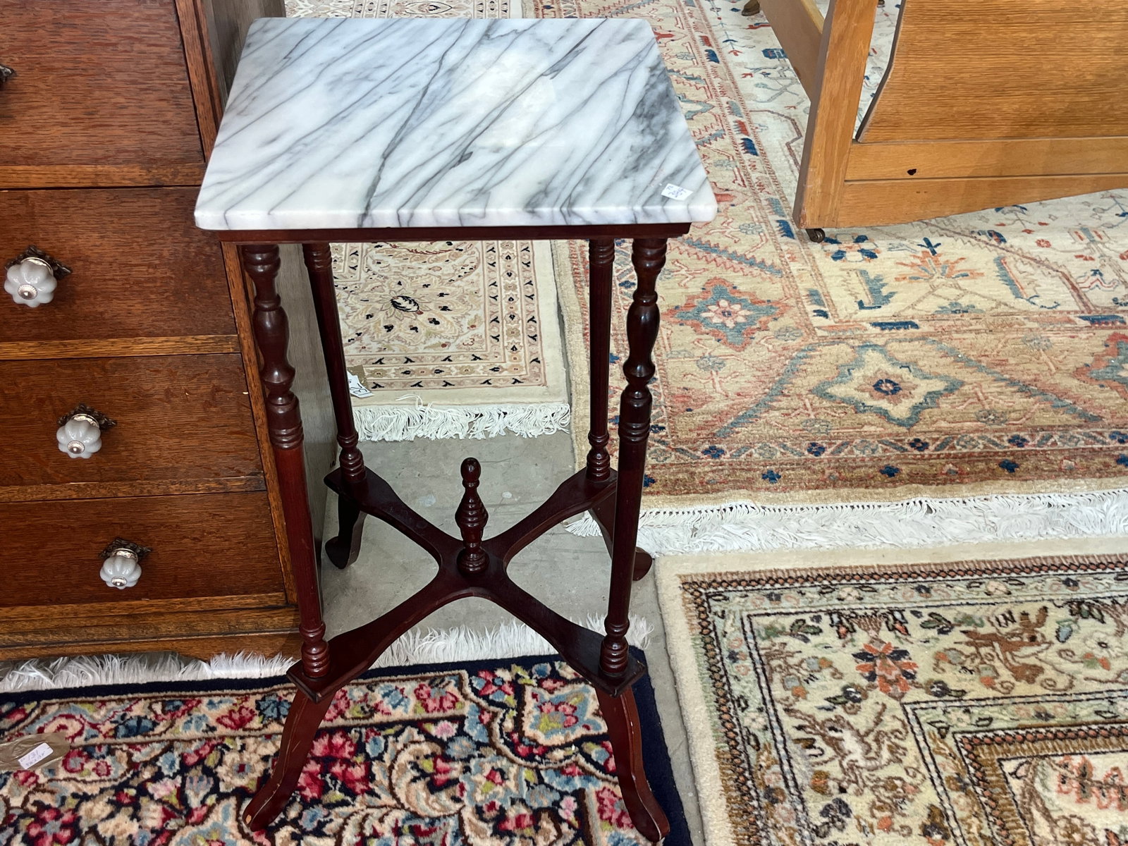 VTG Marble Top Mahogany Plant Stand / Side Table ? 28" H x 14" Sq.: VTG tall plant stand or occasional side table measuring approximately 28" H x 14" square, featuring a substantial square white marble top with attractive natural gray veining. The dark mahogany-finish