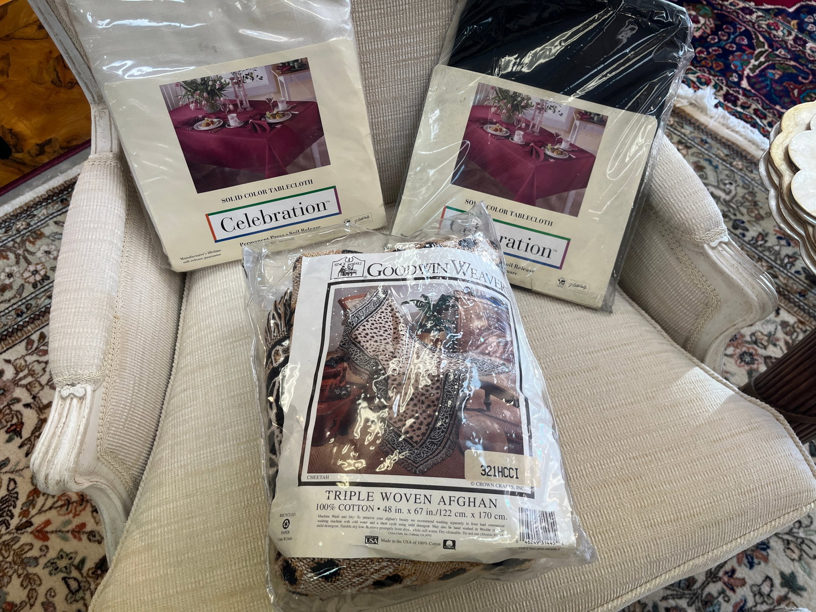 VTG Goodwin Weavers Cheetah Afghan & 2 New Celebration Tablecloths ? 3 Pcs.: Three-piece VTG home textile lot sold together as one number. Includes a Goodwin Weavers / Crown Crafts triple-woven ?Cheetah? afghan, made in the USA of 100% cotton and measuring approximately 48" x 