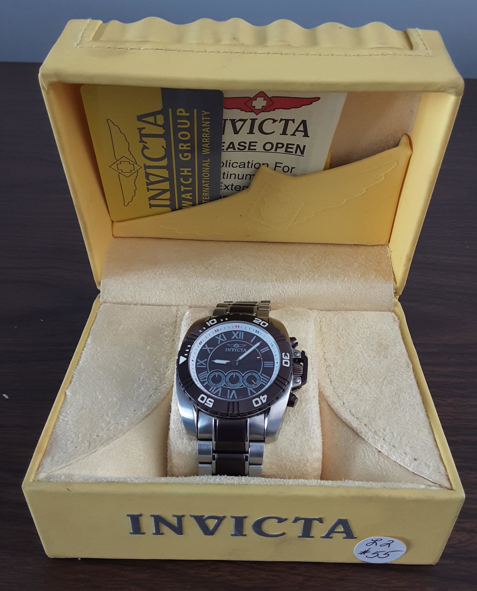 Nice Mens Invicta chronograph wrist watch: Nice Mens Invicta chronograph wrist watch. In the original box with papers. Note this watch needs a little TLC. Needs a pin in the band etc . Sold as is.