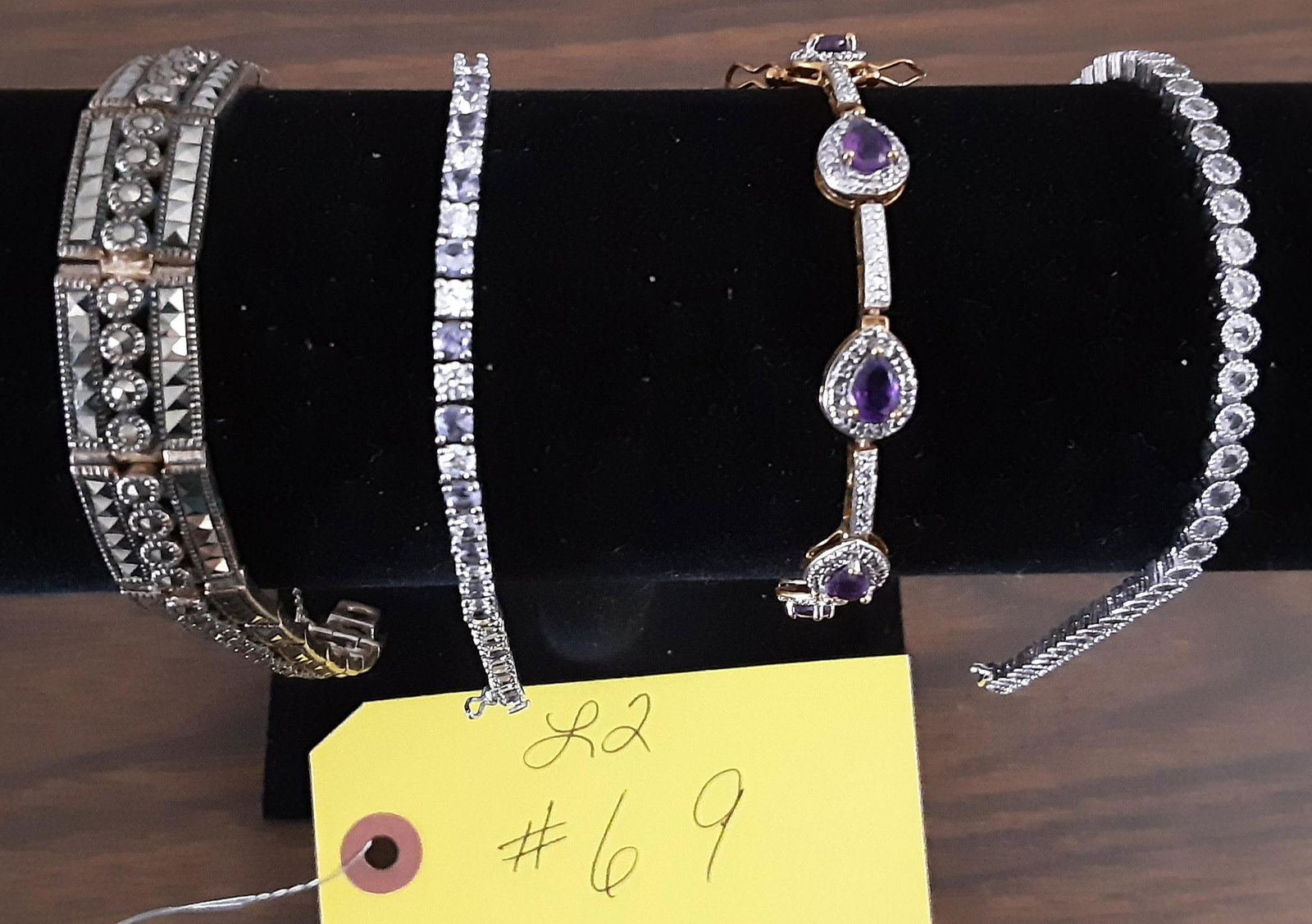 4 beautiful Sterling silver ladies vintage bracelets: 4 beautiful Sterling silver ladies vintage bracelets. Set with a variety of gems including amethyst, marcasite etc . All for one money.