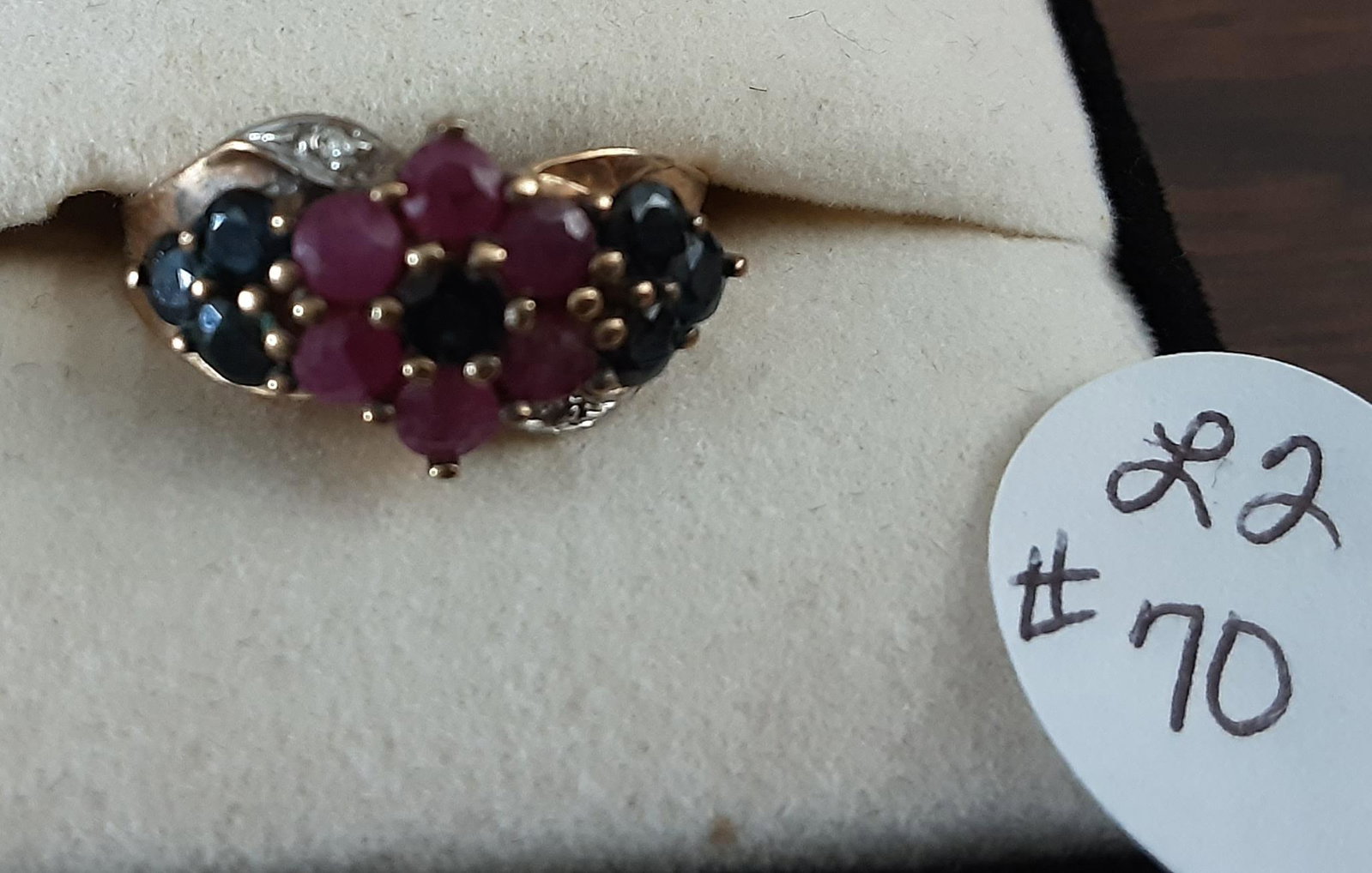Dealers lot of rings and earrings: Dealers lot of rings and earrings. Including a beautiful solid gold set with genuine rubies and sapphires. 5 Sterling silver rings and a fine pair of Sterling silver earrings. Sold as a lot for one mo