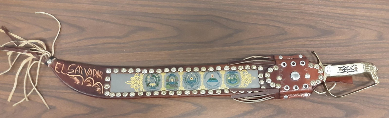 Fantastic, eagle head, El Salvador sword: Fantastic, eagle head, El Salvador sword. Serial number 152 of only 500 ever made. This sword features Guatemala, Honduras, El Salvador, Nicaragua and Costa Rica. A fabulous hard to find sword to add 