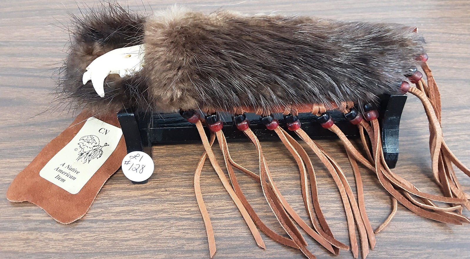 Rare one of a kind Native American side knife: Rare one of a kind Native American side knife. This knife features coyote jawbone for the handle, Obsidian blade and an amazing sheath covered with fur. This knife is attributed to the Cherokee Native