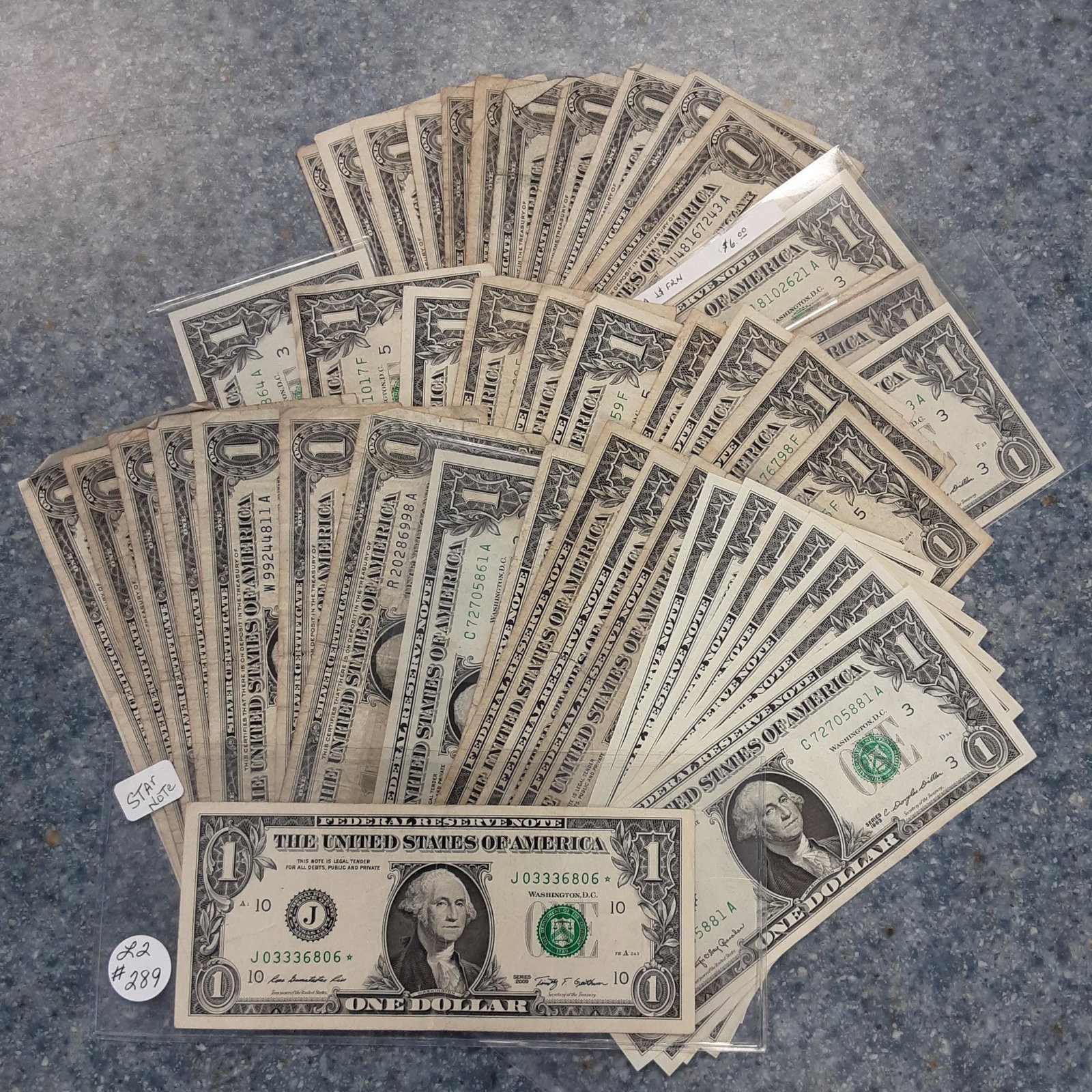 $46 in face value of collectible US $1 bills: A great collection all for one money. You are bidding on $46 in face value of collectible US $1 bills, being star notes, silver certificates, some in consecutive order. A great collection.
