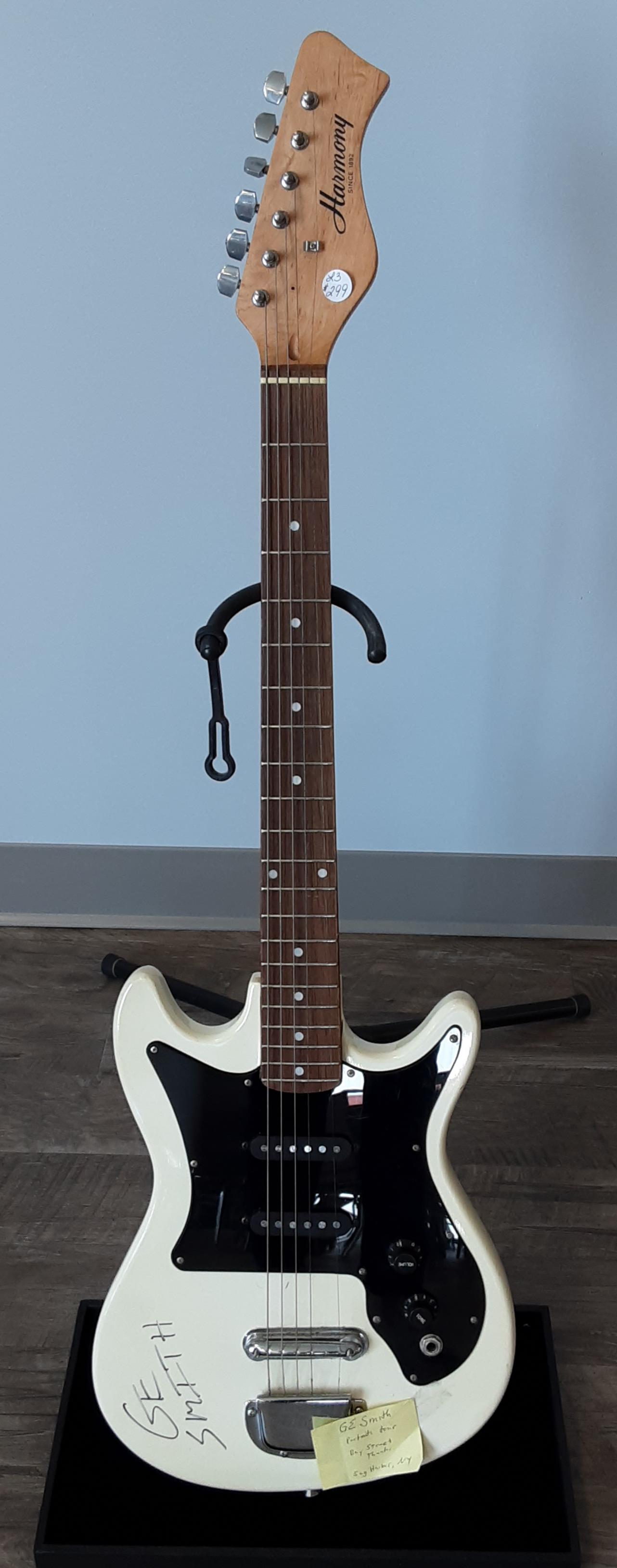 Harmony electric guitar, autographed by GE Smith: Rare, early Harmony electric guitar, hand signed, autographed by GE Smith , born in 1952 and played with Hall and Oates, and worked on Saturday Night Live, as the leader of their band. A highlight to 