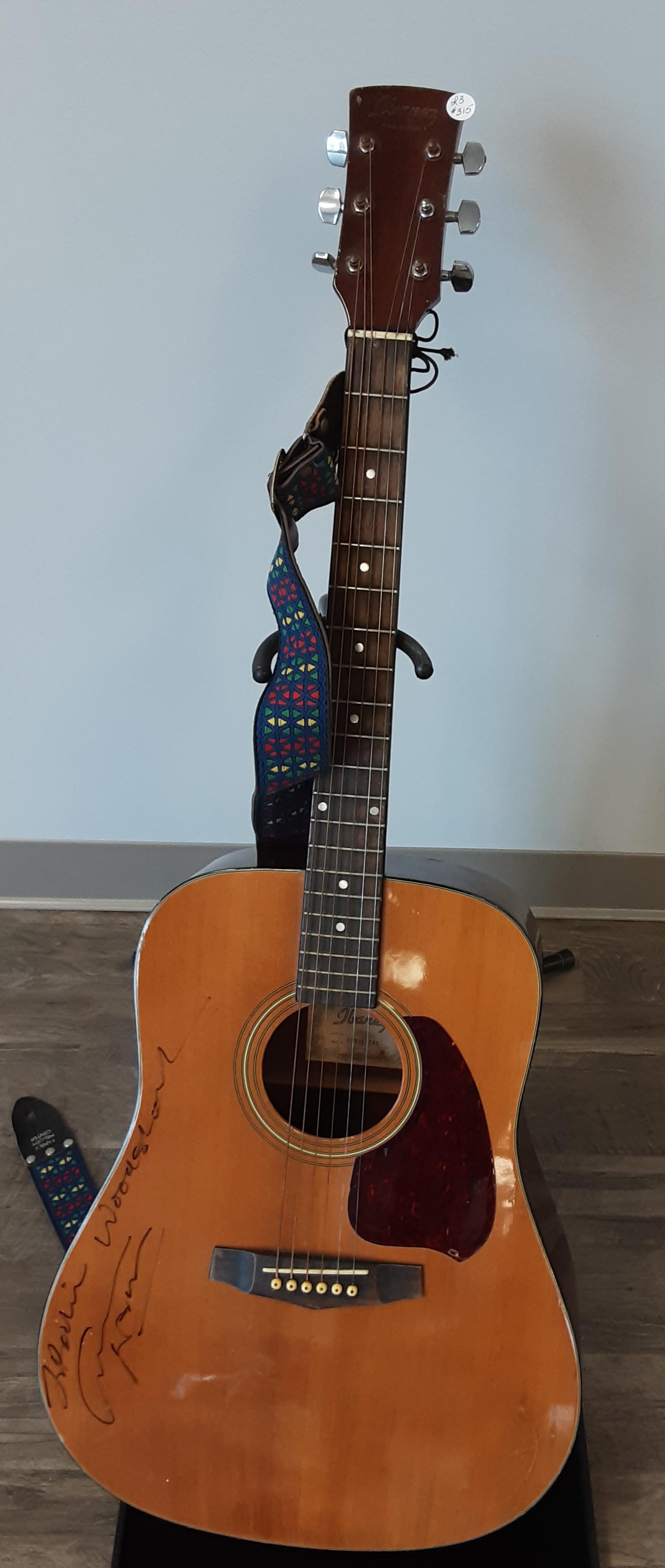Acoustic guitar with case, autographed by Graham Nash: Vintage Ibanez acoustic guitar with case, hand signed and autographed by Graham Nash. Note also signed Woodstock.