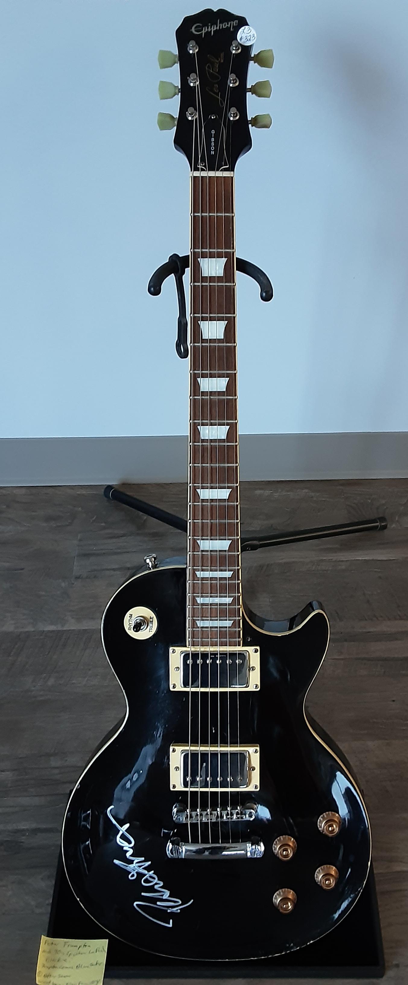 Guitar, autographed by Peter Frampton: A super special guitar. Lest Paul, black beauty, Gibson/ Epiphone, classic electric guitar, hand signed and autographed by Peter Frampton, Frampton comes alive, do you feel like I do. With case.