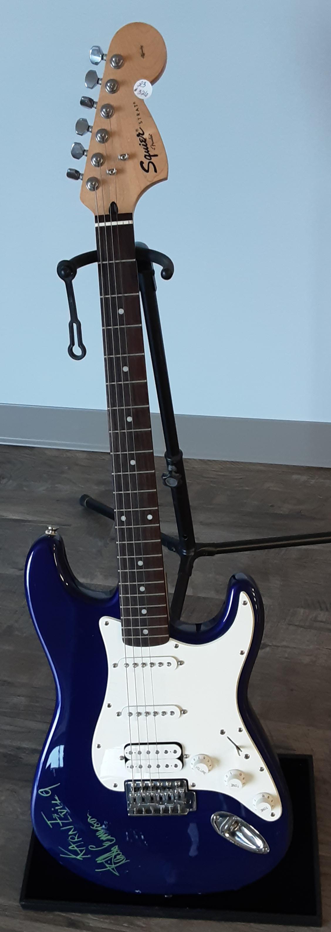 Electric guitar, autographed by Keith Emerson: Stunning dark blue fender's Squier Strat, electric guitar. Hand signed and autographed by Keith Emerson from the famous, Emerson Lake and Palmer band. A superb addition to your collection.