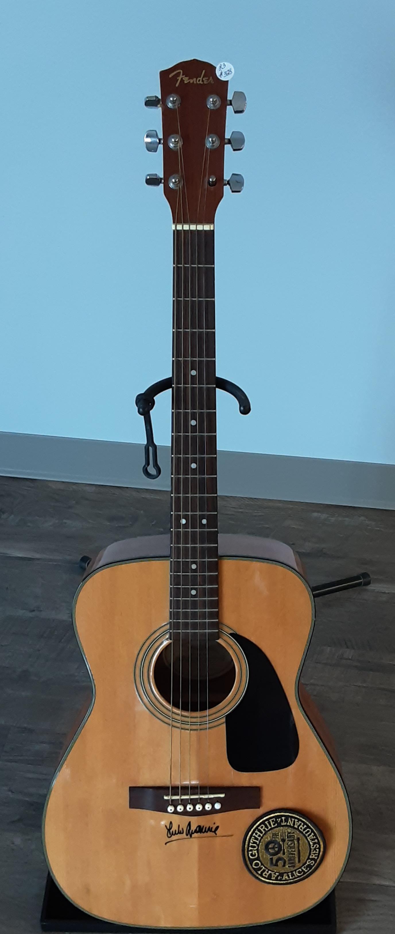 Fender acoustic guitar, autographed by Arlo Guthrie: Rare, Fender acoustic guitar. Hand signed and autographed by Arlo Guthrie, songwriter and singer . Famous for writing, singing Alice's Restaurant and the City of New Orleans.