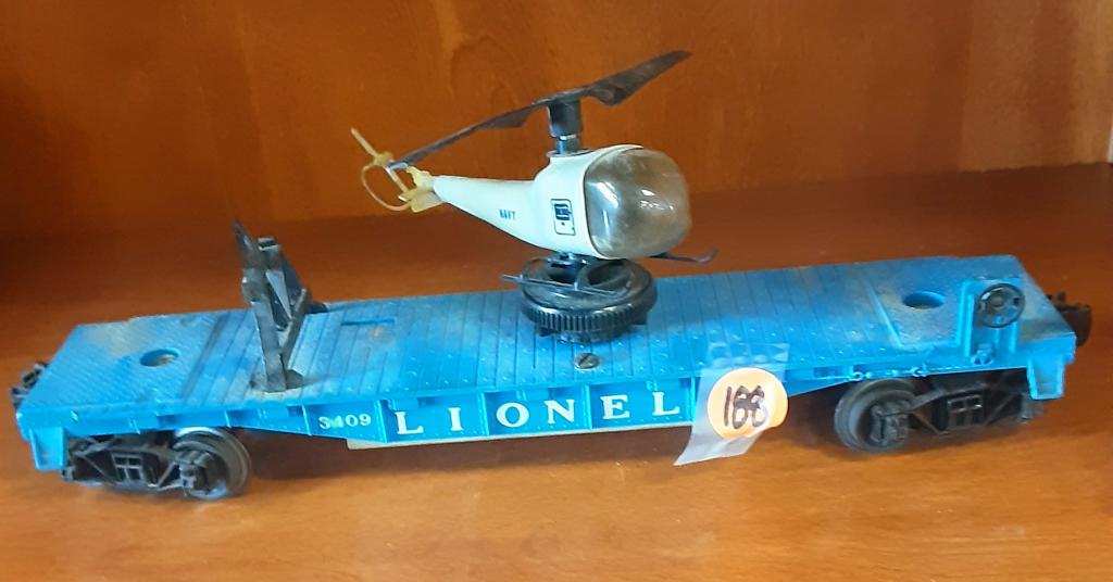 LIONEL HELICOPTER HAULER TRAIN You are bidding on a: You are bidding on a LIONEL HELICOPTER HAULER TRAIN... a great piece to add to your collection!