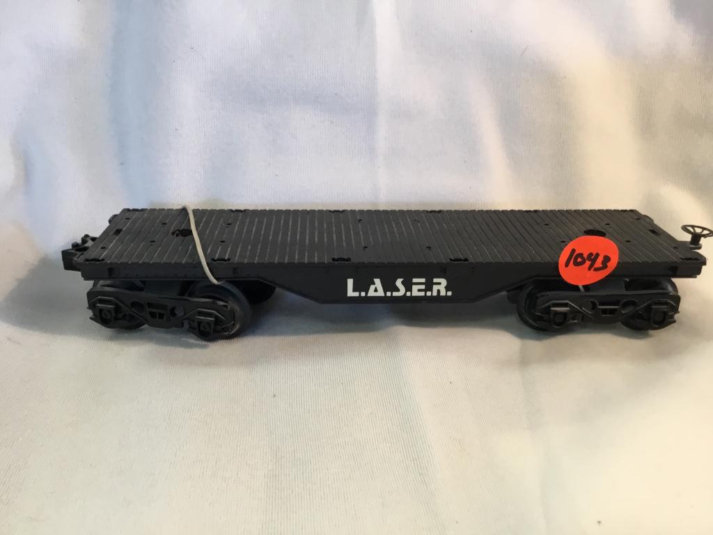 LIONEL L.A.S.E.R. FLAT BED CAR You are bidding on a: You are bidding on a LIONEL L.A.S.E.R. FLAT BED CAR ... a great item to add to your collection!