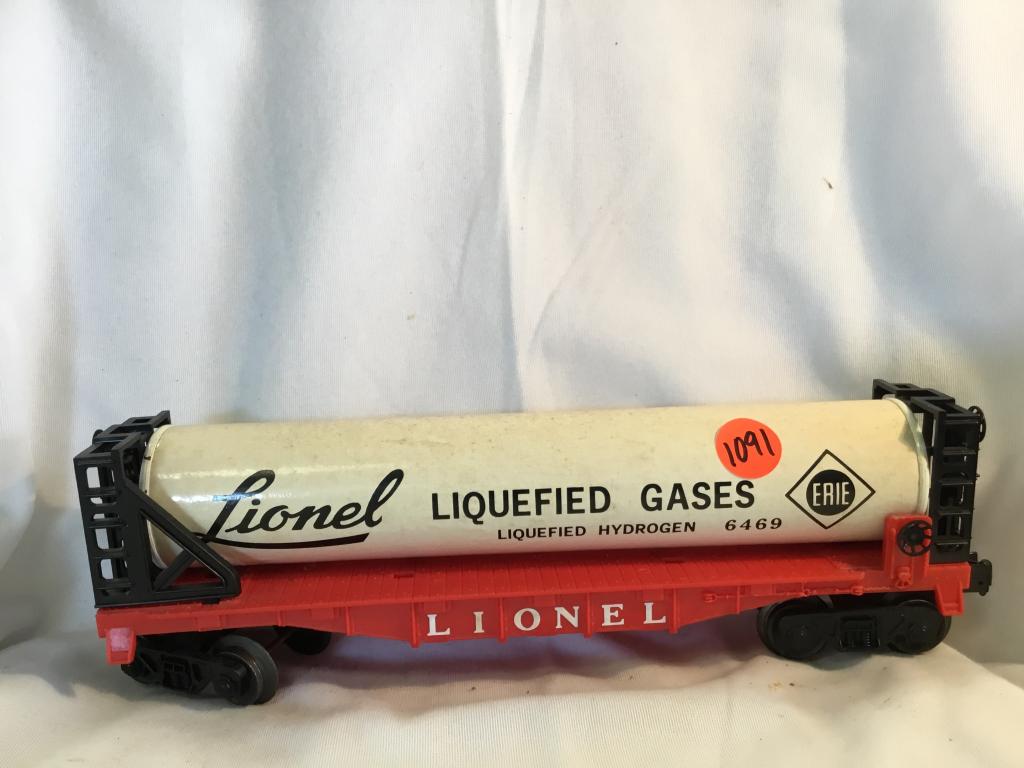 LIONEL ERIE LIQUIFIED GAS TANKER FLAT BED CAR You are: You are bidding on a LIONEL ERIE LIQUIFIED GAS TANKER FLAT BED CAR.... a wonderful addition to your collection!