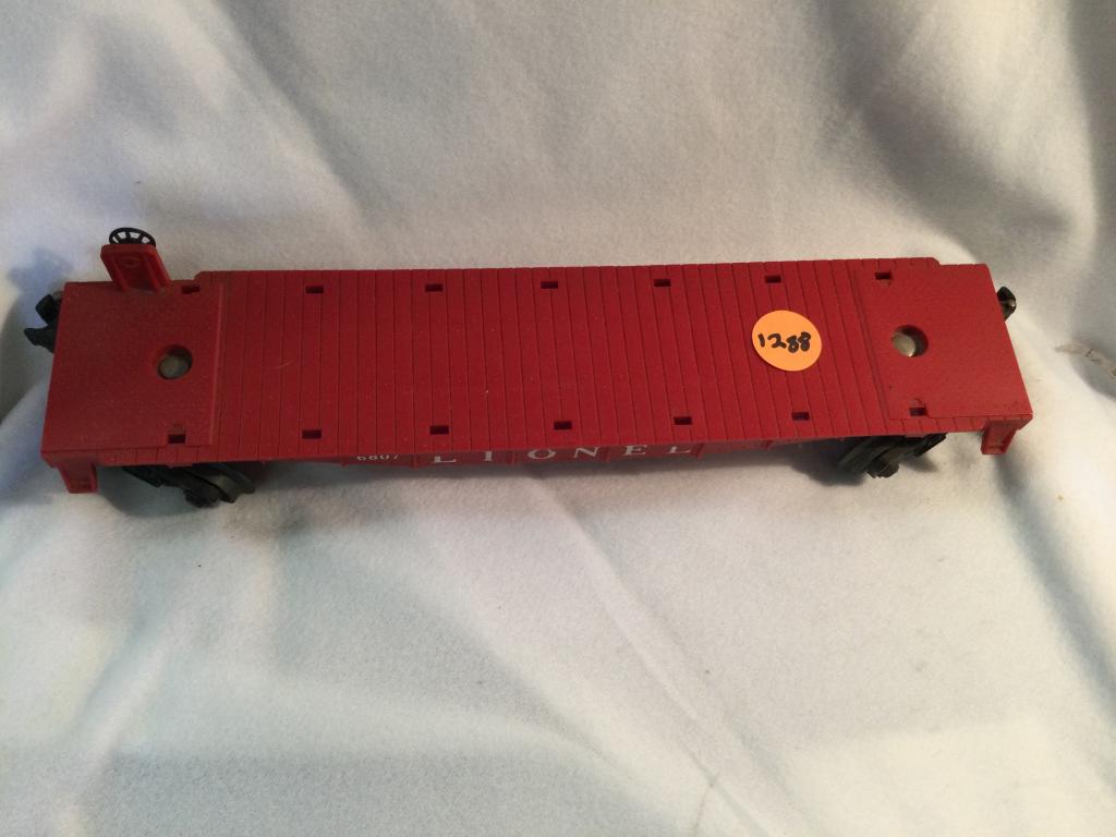LIONEL #6807 FLAT BED TRAIN CAR YOU ARE BIDDING ON A: YOU ARE BIDDING ON A LIONEL #6807 FLAT BED TRAIN CAR... A GREAT ADDITION TO YOUR COLECTION!
