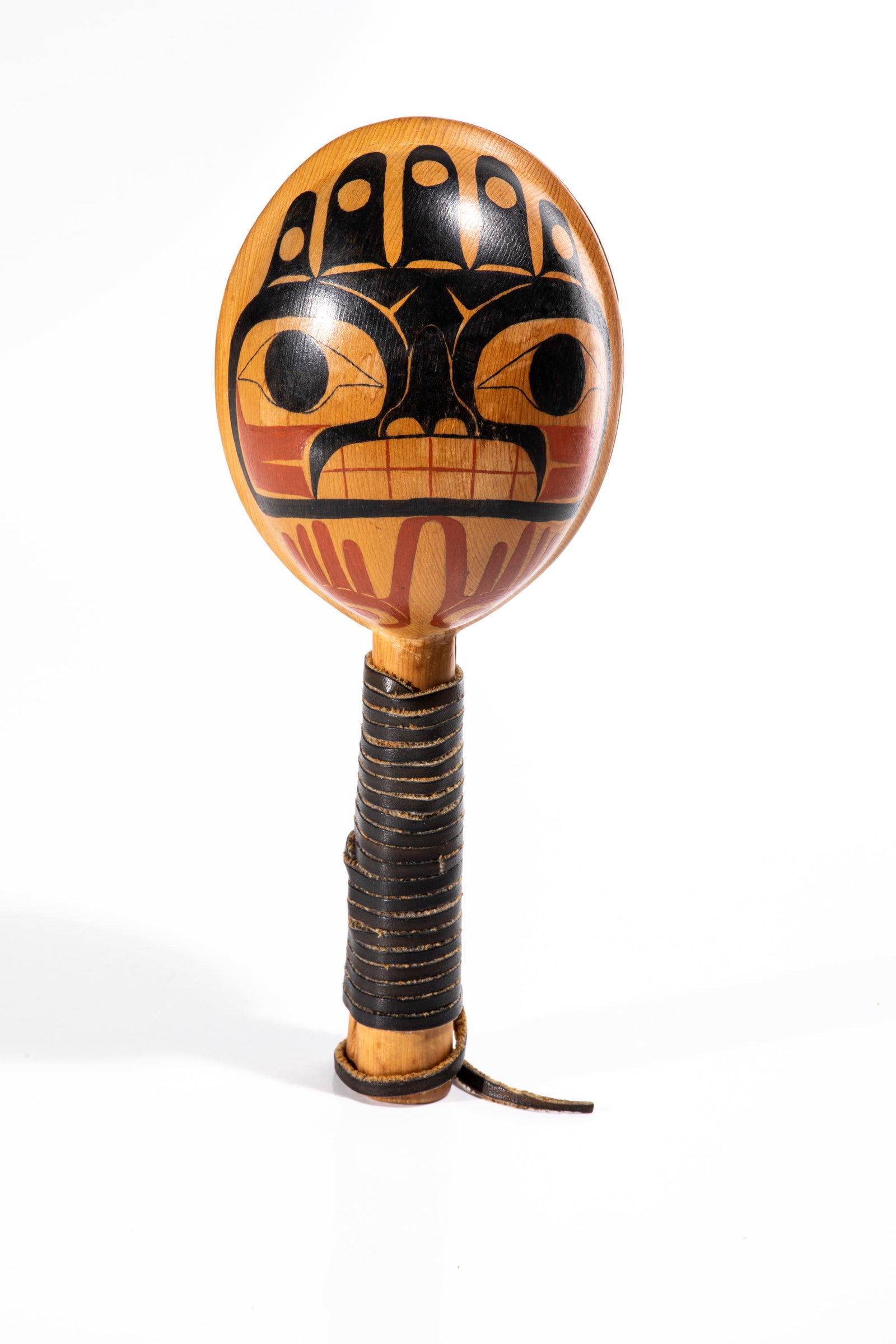 UNIDENTIFIED MAKER, HAIDA, Rattle: UNIDENTIFIED MAKER, HAIDA Rattle maple wood painted, according to Dr. MacDonald, with representation of the five finned killer whale of Chief Nan Sdins [Ninstints], with hide thongs wrapping