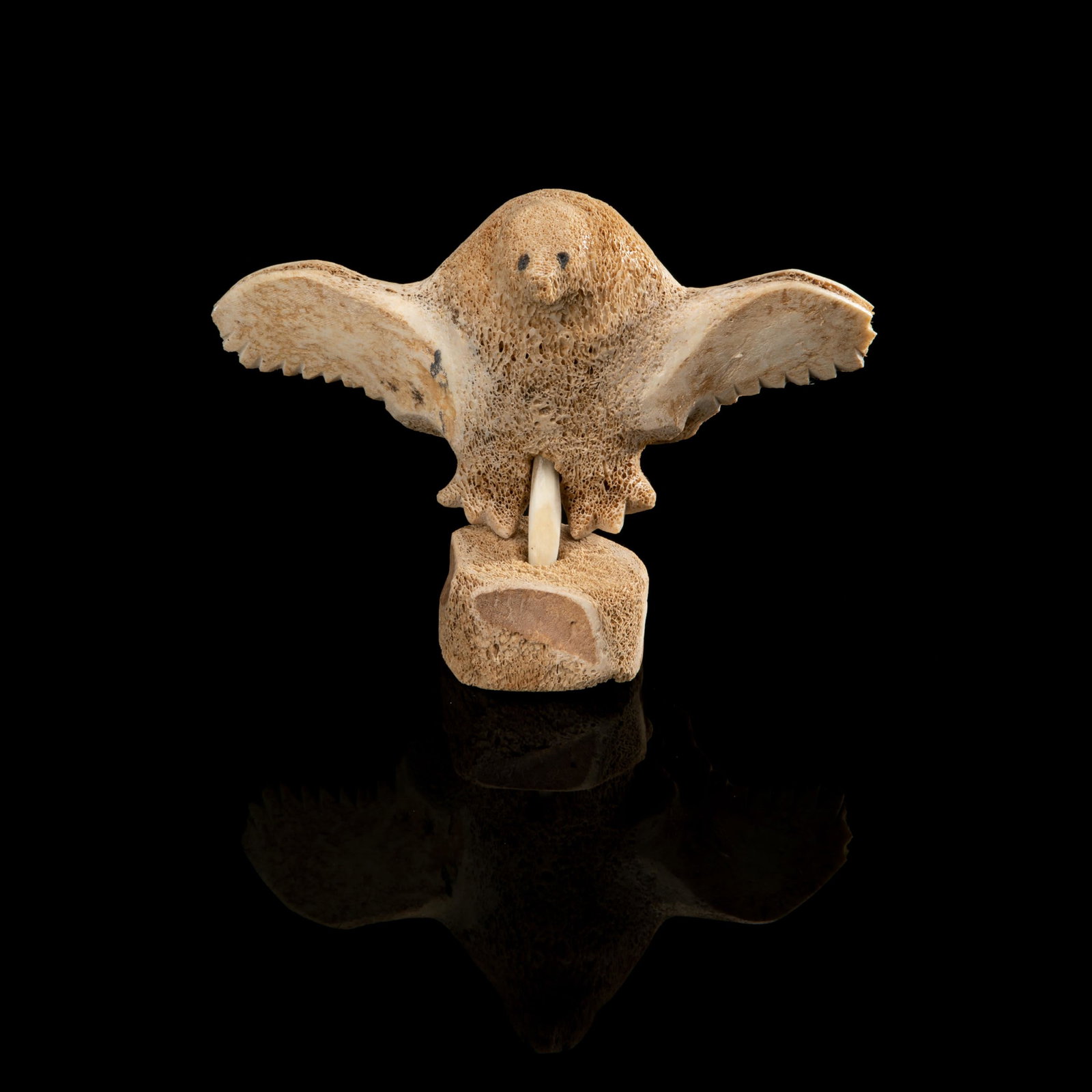 UNIDENTIFIED ARTIST, Inuit, Bird in Flight: UNIDENTIFIED ARTIST Bird in Flight whalebone with black pigment, 3.5 x 8 x 4 in (8.9 x 20.3 x 10.2 cm) unsigned.