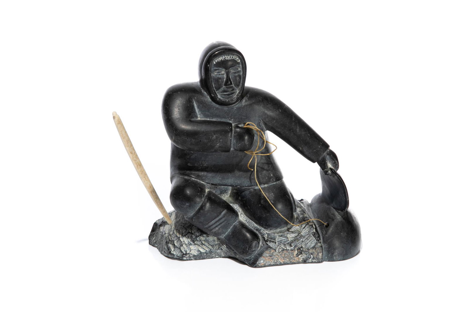 THOMASSIE TUKAI, Inuit, Hunter with Catch, early 1960s: THOMASSIE TUKAI (1937-D) INUKJUAK (PORT HARRISON) Hunter with Catch, early 1960s stone, sinew, and antler 7.5 x 7.5 x 4 in (19.1 x 19.1 x 10.2 cm) signed and inscribed with artist's partial disc numbe