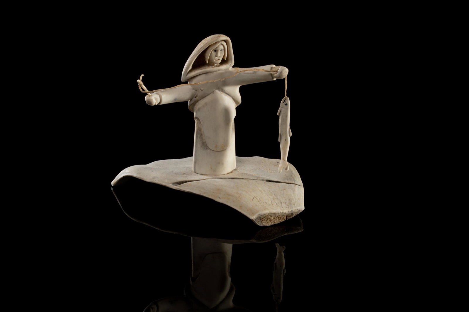 PETER MORGAN, INUIT, Woman Jigging for Fish, 1986: PETER MORGAN (1951-2018) KANGIQSUALUJJUAQ (GEORGE RIVER) Woman Jigging for Fish, 1986 antler, 8 x 7.5 x 8.75 in (20.3 x 19.1 x 22.2 cm) signed, "ᐱᑕ ᒧᐊᑲ"; dated "1986" to 