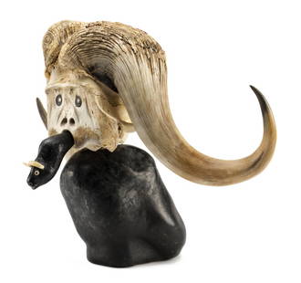 JUDAS ULLULAQ, INUIT, Muskox Shaman with Spirit Helper,: Lot 24 JUDAS ULLULAQ (1937-1999) UQSUQTUUQ (GJOA HAVEN) Muskox Shaman with Spirit Helper, c. 1988-89 stone, muskox horn, and antler, 17.75 x 25 x 15 in (45.1 x 63.5 x 38.1 cm) signed, "ᐅᓗ&