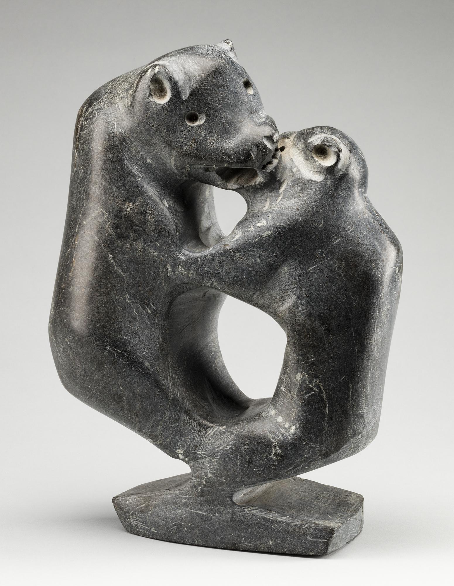 JOHN KAVIK, INUIT, Sparring Polar Bears, c. 1973-74: JOHN KAVIK (1897-1993) KANGIQLINIQ (RANKIN INLET) Sparring Polar Bears, c. 1973-74 stone, 11 x 7.75 x 4 in (27.9 x 19.7 x 10.2 cm) signed, "á‘²á••". ESTIMATE: $6,000 â€” $9,000 Proven