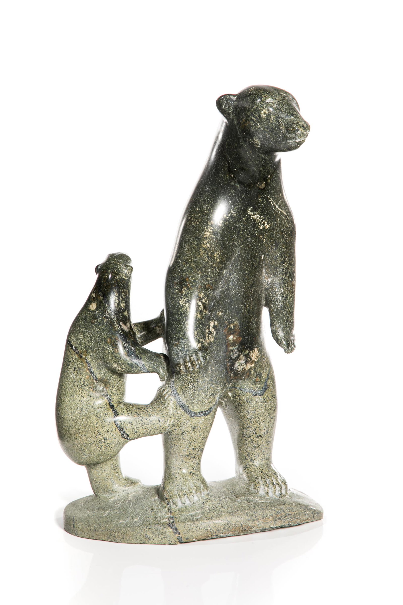 ENUKEE AKULUKJUK, INUIT, Polar Bear with Cub, 1979: ENUKEE AKULUKJUK (1943-) PANNIRTUQ (PANGNIRTUNG) Standing Polar Bear with Playful Cub, 1979 stone, 15.5 x 9 x 7 in (39.4 x 22.9 x 17.8 cm) signed, "INOOKIE"; inscribed and dated, "ALLEN ISLAND / 1979"