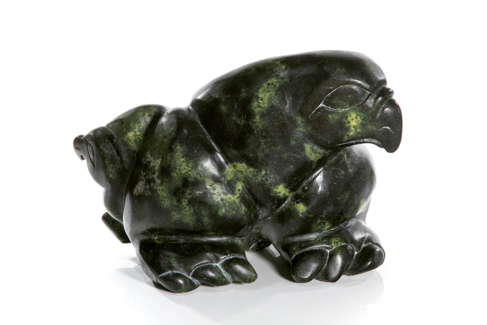 KOOMWARTOK ASHOONA, INUIT, Mother Bird with Young, 1970s: KOOMWARTOK ASHOONA (1930-1984) KINNGAIT (CAPE DORSET) Mother Bird with Young, 1970s stone, 12 x 18.5 x 10.5 in (30.5 x 47 x 26.7 cm) signed with artist's initials, "K / A". Provenance Corporate Collec