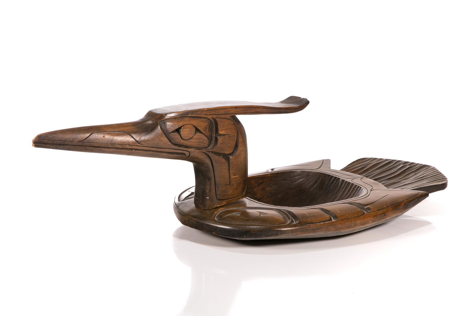 UNIDENTIFIED ARTIST, KWAKWA̱KA̱ʼWAKW, Loon Carved Grease Bowl, c. 1980s: UNIDENTIFIED ARTIST, KWAKWA̱KA̱'WAKW Loon Carved Grease Bowl, c. 1980s carved wood, 7 x 26 x 10 in (17.8 x 66 x 25.4 cm) inscribed indistinctly, "Loon [?] / Kwakiutl / [?] , B.C / [?]". Prov