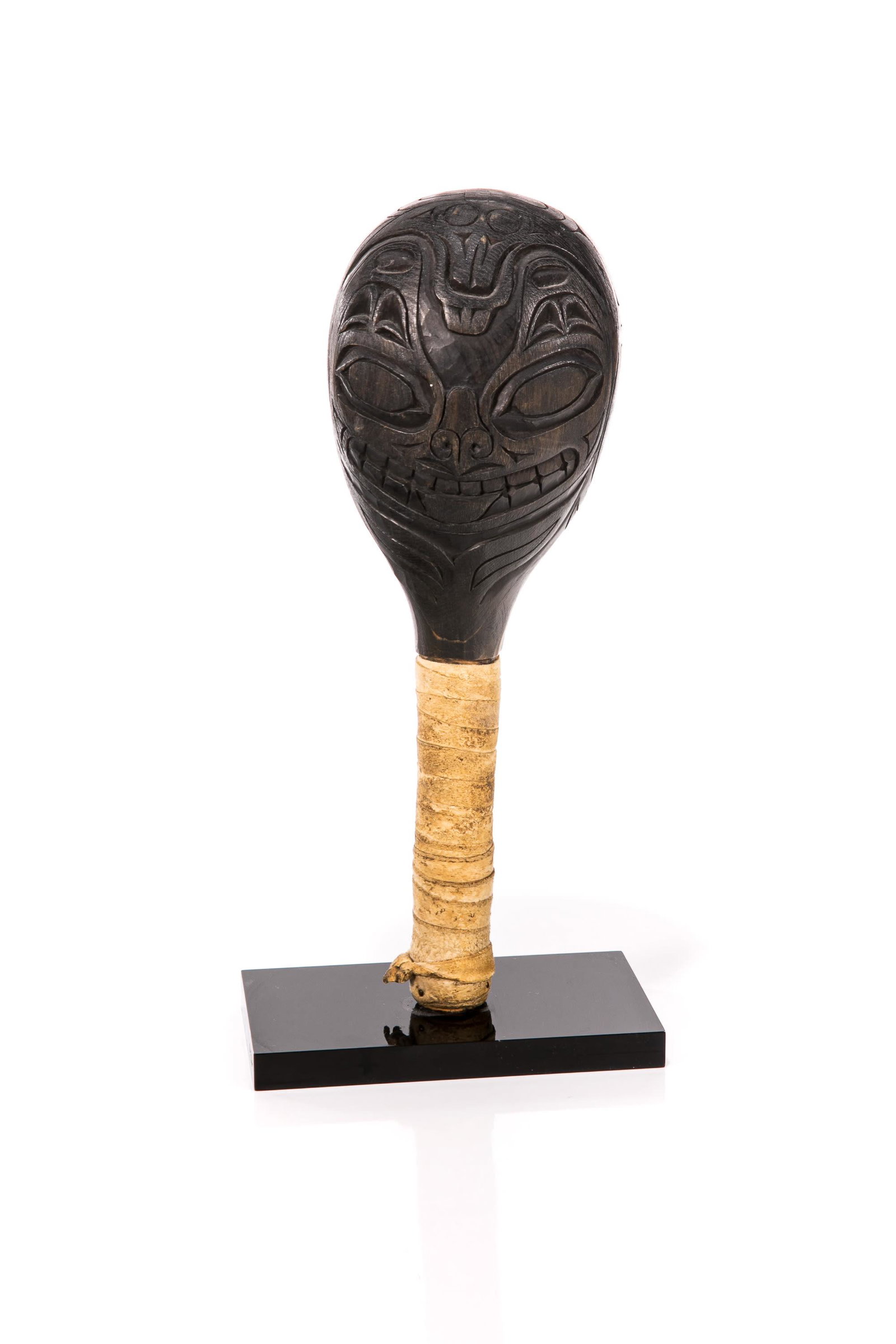 UNIDENTIFIED, N. NORTHWEST COAST, POSSIBLY TSIMSHIAN, Relief Carved Rattle, 1970s: UNIDENTIFIED ARTIST, NORTHERN NORTHWEST COAST, POSSIBLY TSIMSHIAN Relief Carved Rattle, 1970s alder wood and hide, 10 x 3.25 x 3 in (25.4 x 8.3 x 7.6 cm) inscribed with initials, "CDK"; carved in low 