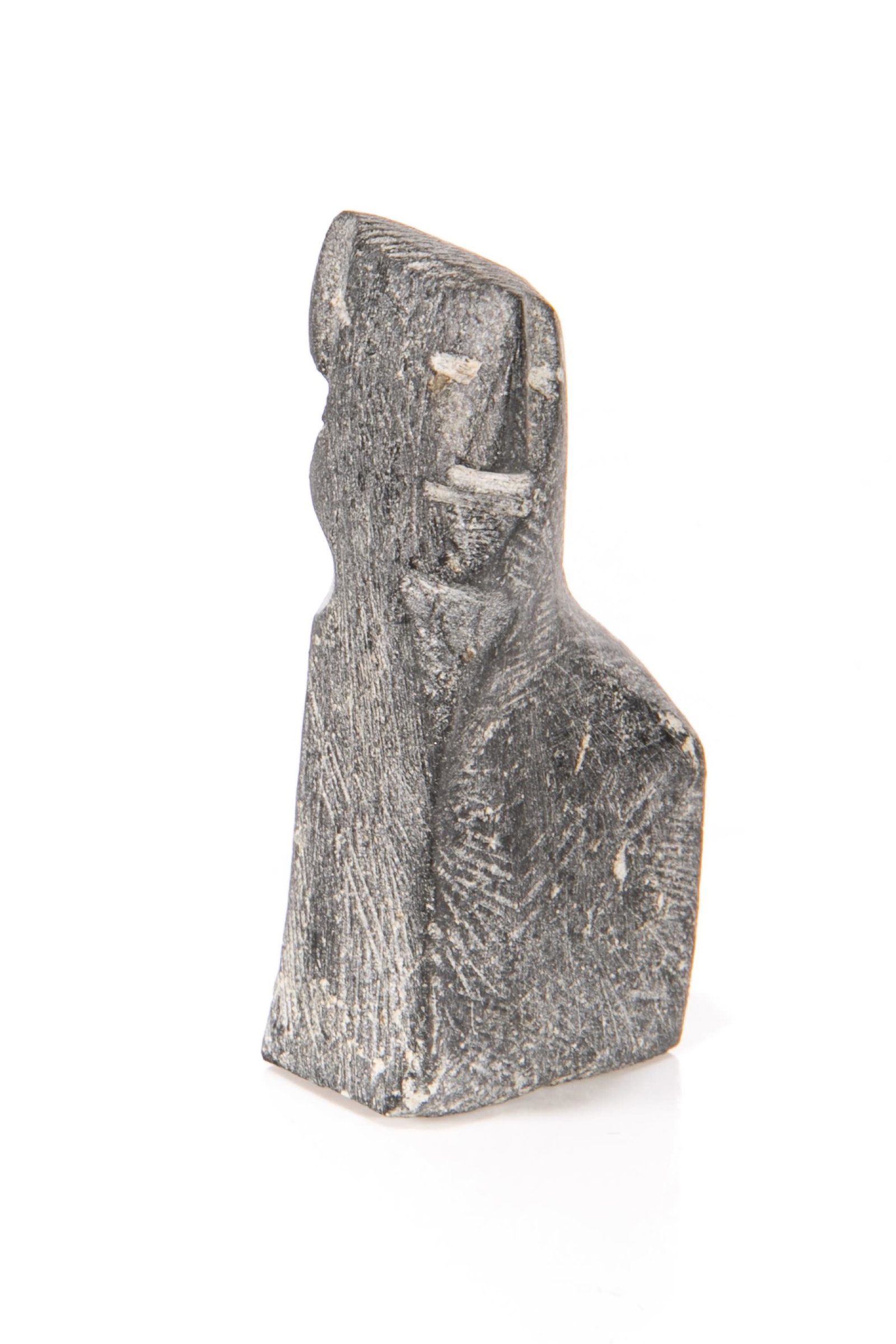 LUCY TASSEOR, INUIT, Mother with Child in Her Amaut, mid 1980s: LUCY TASSEOR TUTSWEETOK (1934-2012) ARVIAT (ESKIMO POINT) Mother with Child in Her Amaut, mid 1980s stone, 2.5 x 1.25 x 1 in (6.3 x 3.2 x 2.5 cm) signed,"ᓗᓯ". Provenance Important Private 
