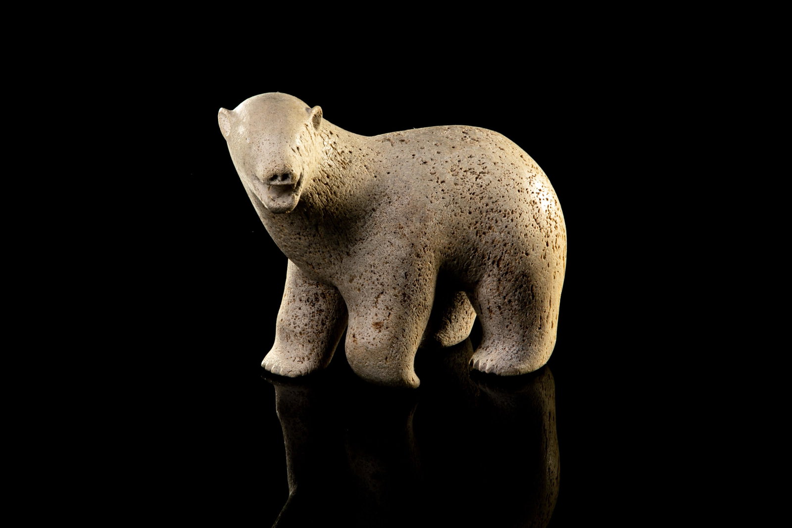 UNIDENTIFIED, INUIT, Polar Bear, late 1960s: UNIDENTIFIED ARTIST, Probably TALOYOAK (SPENCE BAY) Polar Bear, late 1960s whalebone, 6.75 x 8.25 x 4.5 in (17.1 x 21 x 11.4 cm) unsigned. Provenance Private Collection, Ottawa.