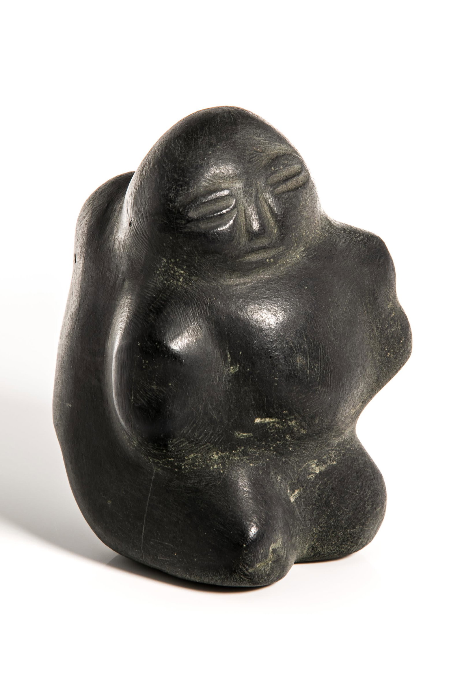 JOSEPH ANGATAJUAK, INUIT, Mother and Child, 1973: JOSEPH ANGATAJUAK (1935-1976) KANGIQLINIQ (RANKIN INLET) Mother and Child, 1973 stone, 6.25 x 4.25 x 4 in (15.9 x 108 x 10.2 cm) inscribed with disc number and signed, "E1-486 / áŠá’á‘•�