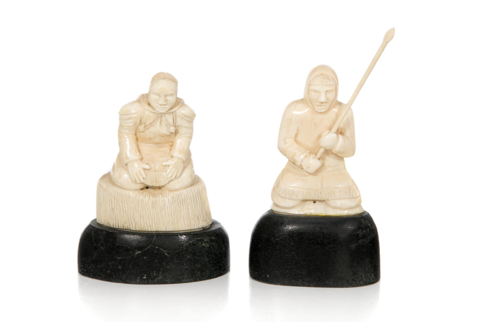 PIERRE KARLIK, INUIT, Hunter & Mother and Child, 1970s: PIERRE KARLIK (1931-2013) KANGIQLINIQ (RANKIN INLET) Hunter with Spear and Mother and Child, 1970s each tusk and stone, man: 5.5 x 3 x 1.5 in (14 x 7.6 x 3.8 cm), measurements include dimensions with 