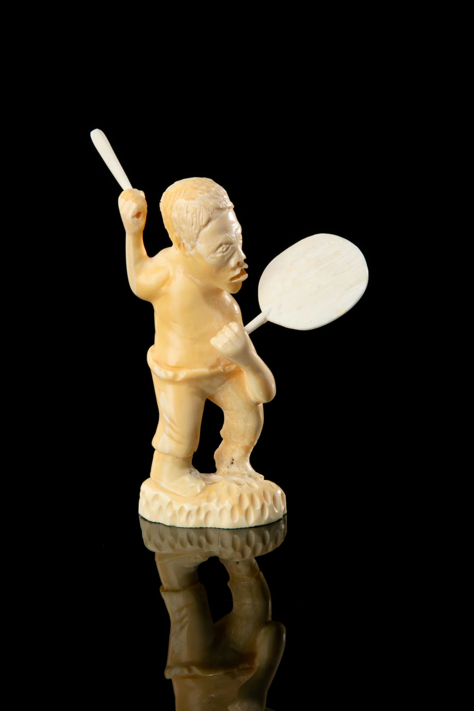 UNIDENTIFIED, GREENLAND, Drum Dancer, 1970s: UNIDENTIFIED GREENLANDIC ARTIST Drum Dancer, 1970s tusk, 5 x 3.25 x 1.5 in (12.7 x 8.3 x 3.8 cm) unsigned. Provenance Important Private Collection, Canada.