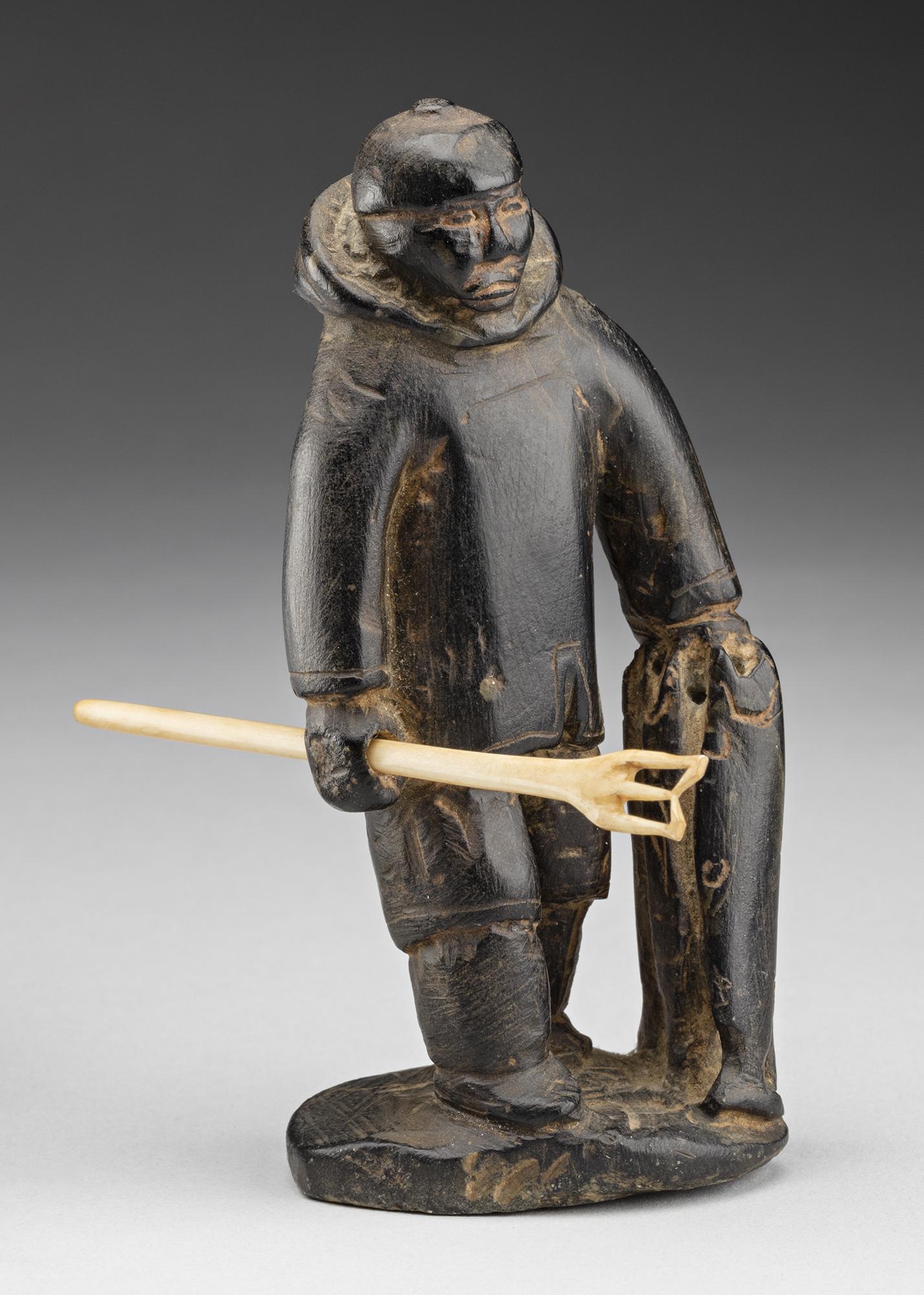 ENNUTSIAK, INUIT, Kakivak Fisherman with Catch, early 1960s (1 of 5)