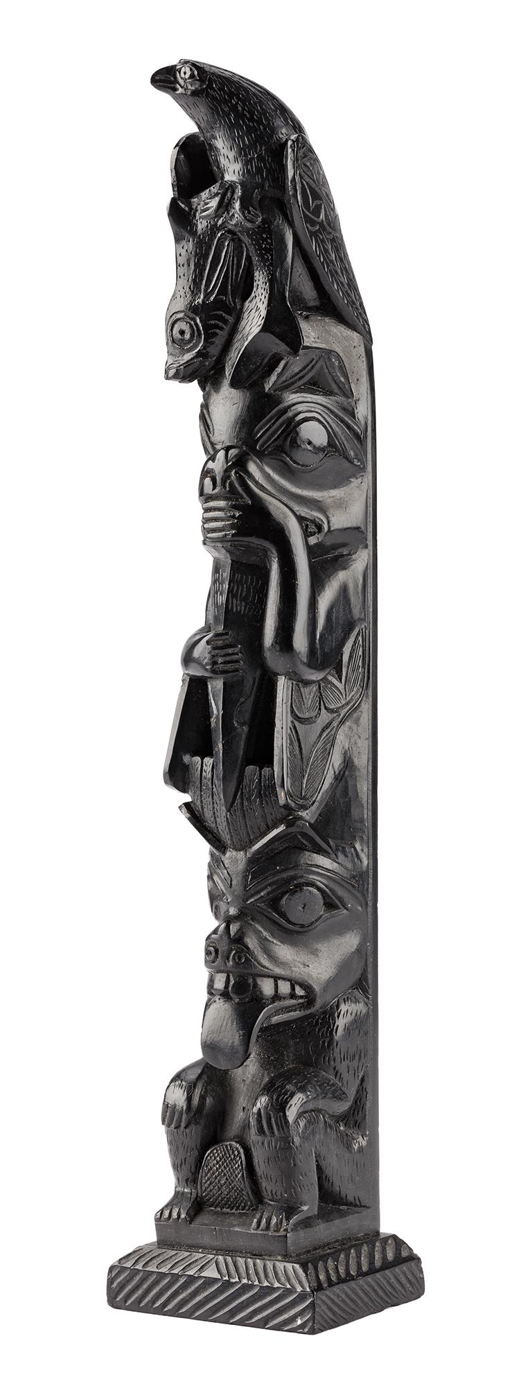 Prob. CAPTAIN ANDREW BROWN, HAIDA, Model Totem Pole, c. 1910: PROBABLY CAPTAIN ANDREW BROWN (1879-1962), HAIDA GWAII Model Totem Pole, c. 1910 argillite, 9.25 x 1.75 x 1 in (23.5 x 4.4 x 2.5 cm) unsigned. Provenance Important Private Collection, Canada. "Captain