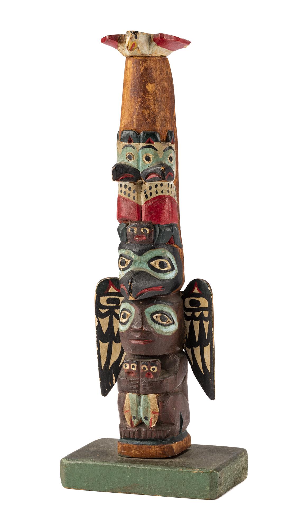 ELI TAIT, TSIMSHIAN, METLAKATLA, ALASKA, Model Totem Pole, c. 1920s or 1930s: ELI TAIT (1872-1949) TSIMSHIAN, METLAKATLA, ALASKA Model Totem Pole, c. 1920s or 1930s carved and painted wood, 7.5 x 2.75 x 2 in (19.1 x 7 x 5.1 cm) unsigned. Provenance Private Collection, Toronto. 