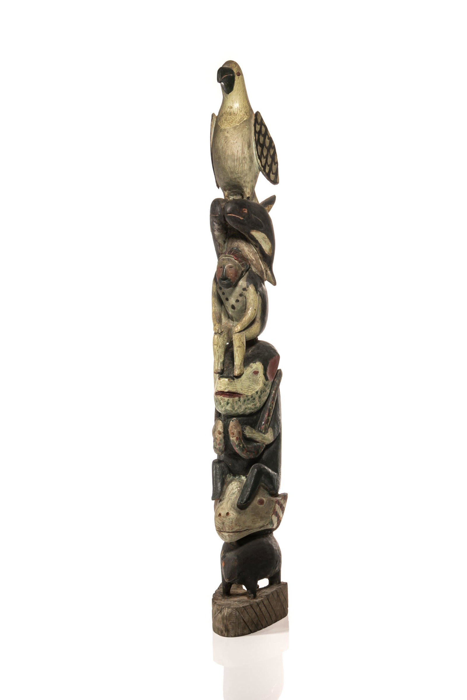 UNIDENTIFIED SALISH or NUU-CHAH-NULTH ARTIST, Model Hollow Back Totem Pole, c. 1890-1910: UNIDENTIFIED SALISH or NUU-CHAH-NULTH ARTIST Model Hollow Back Totem Pole, c. 1890-1910 cedar wood and paint, 30.25 x 3.75 x 5 in (76.8 x 9.5 x 12.7 cm) unsigned. Provenance From the Estate of Thomas 